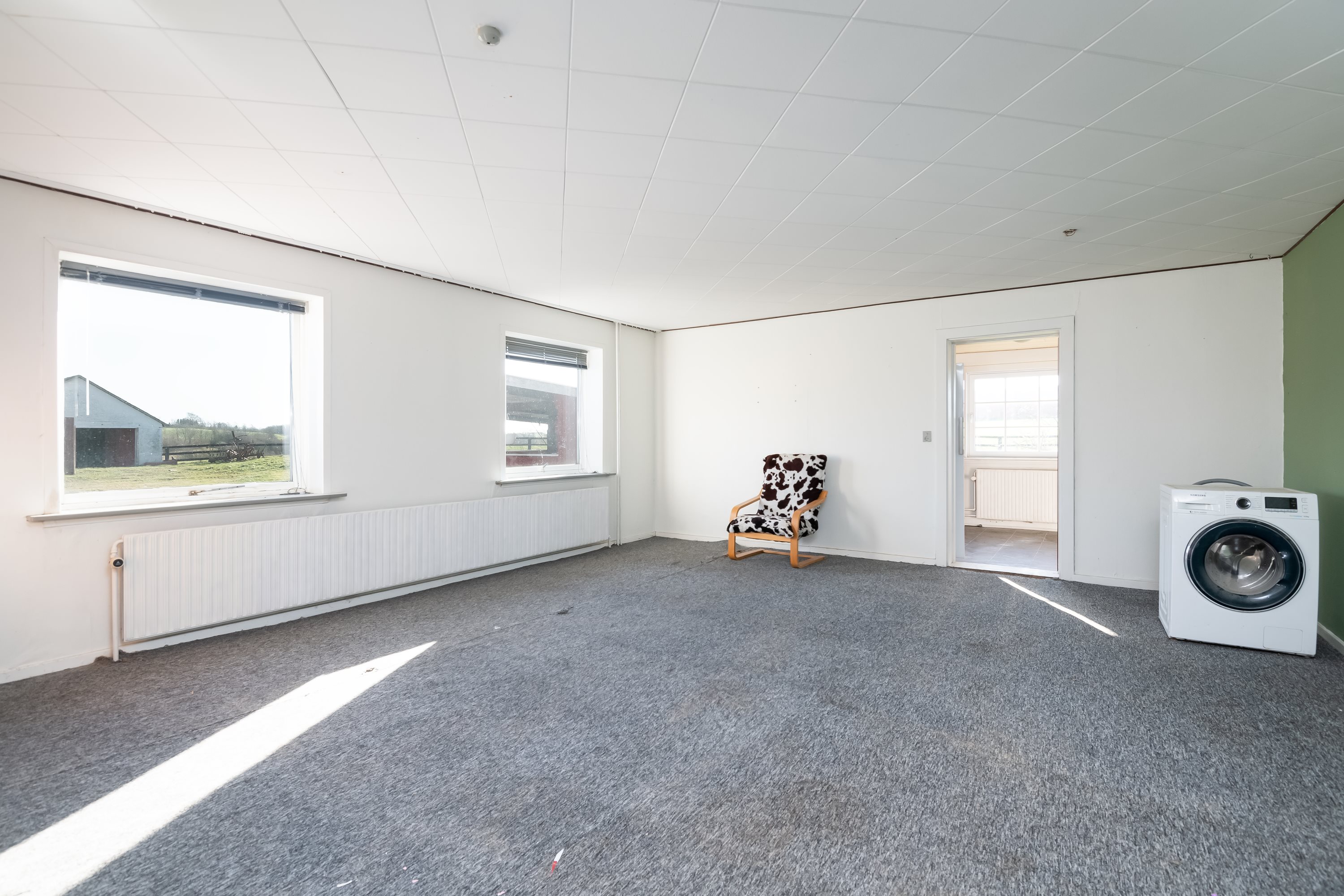 Fremhævet stue billede i fuldskærmstilstand. Billede af Albækvej 168, Lendum, 9870 Sindal