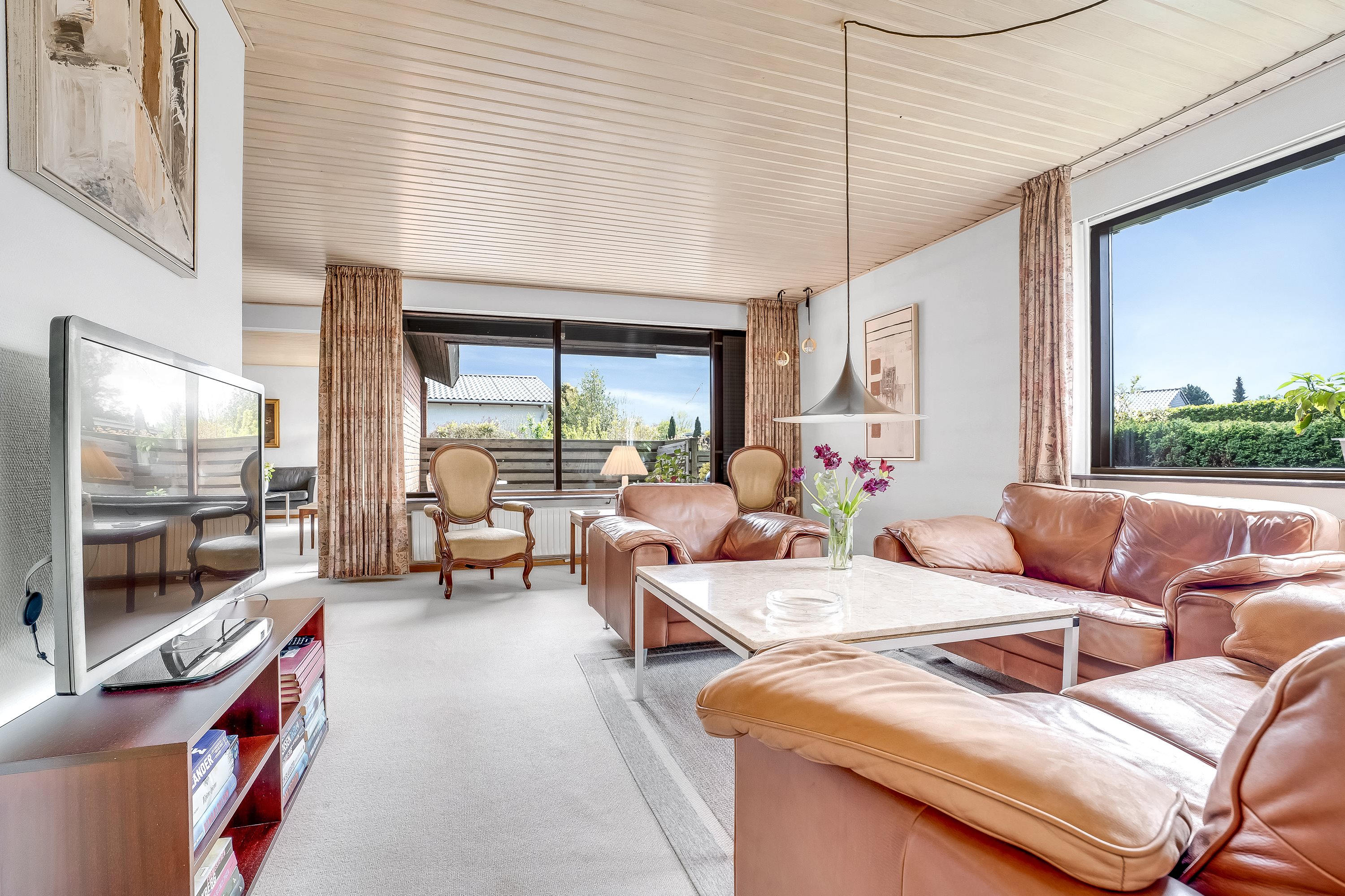 Fremhævet stue billede i fuldskærmstilstand. Billede af Daneborgvej 11, 4800 Nykøbing F