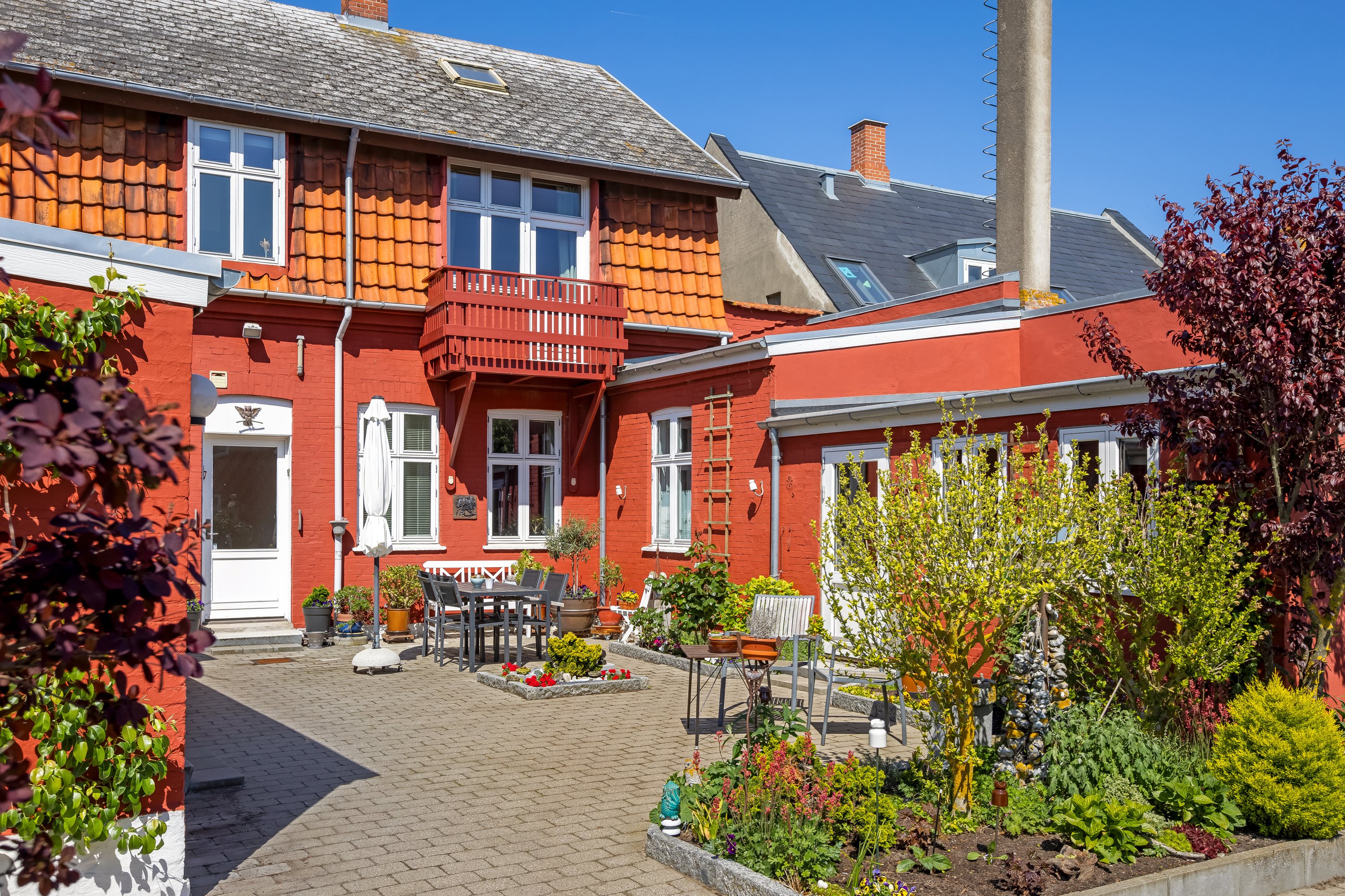 Fremhævet gårdmiljø billede i fuldskærmstilstand. Billede af Sylowsvej 63, 4220 Korsør