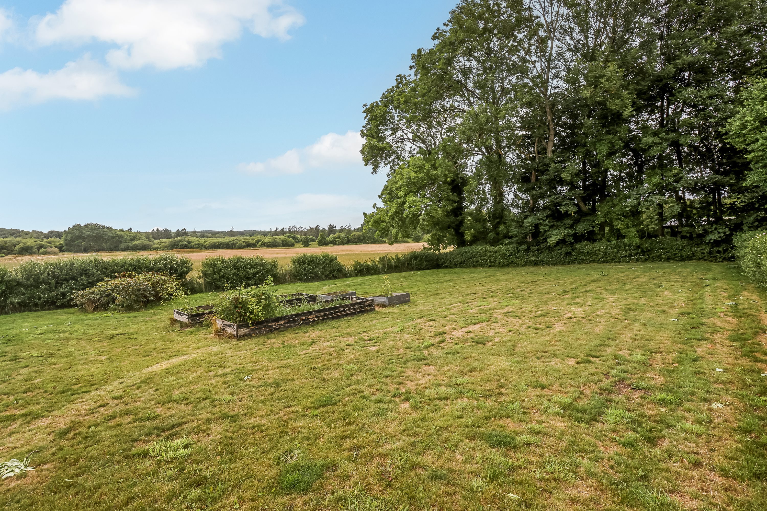 Fremhævet ejendommen billede i fuldskærmstilstand. Billede af Bækkegårdsvej 9, Sparkær, 8800 Viborg