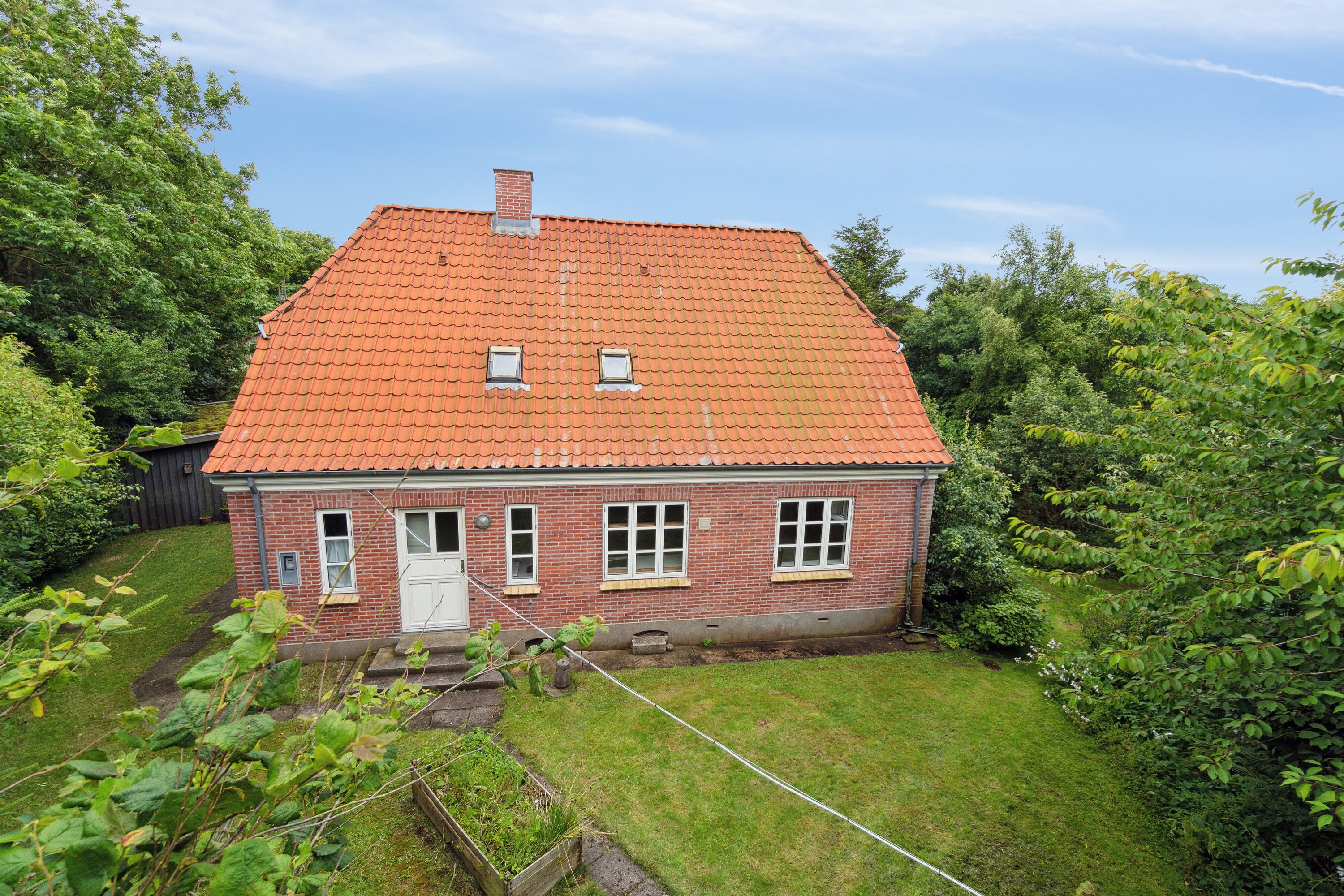 Fremhævet set fra haven billede i fuldskærmstilstand. Billede af Villerslevvej 8, Villerslev, 7755 Bedsted Thy