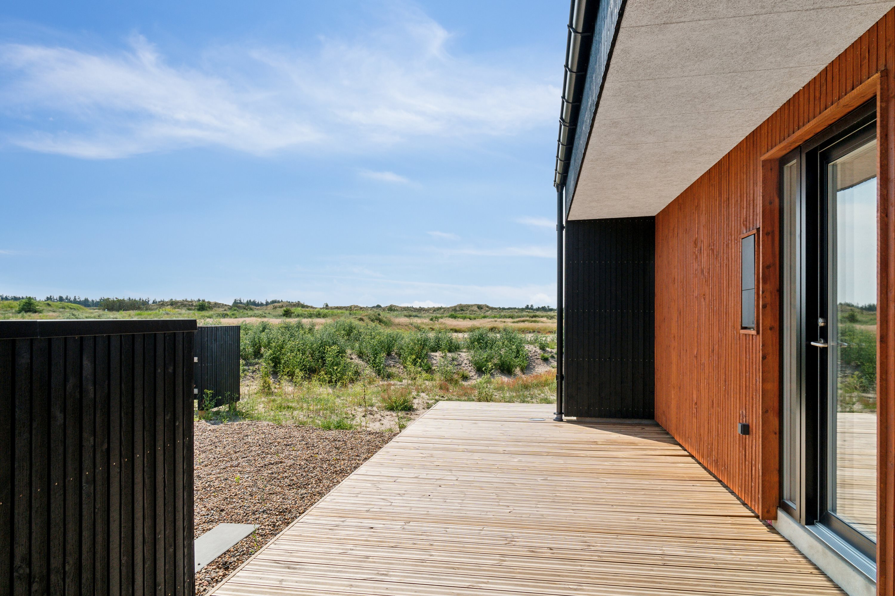 Fremhævet udendørs billede i fuldskærmstilstand. Billede af Sortebærbakken 9, Vorupør, 7700 Thisted