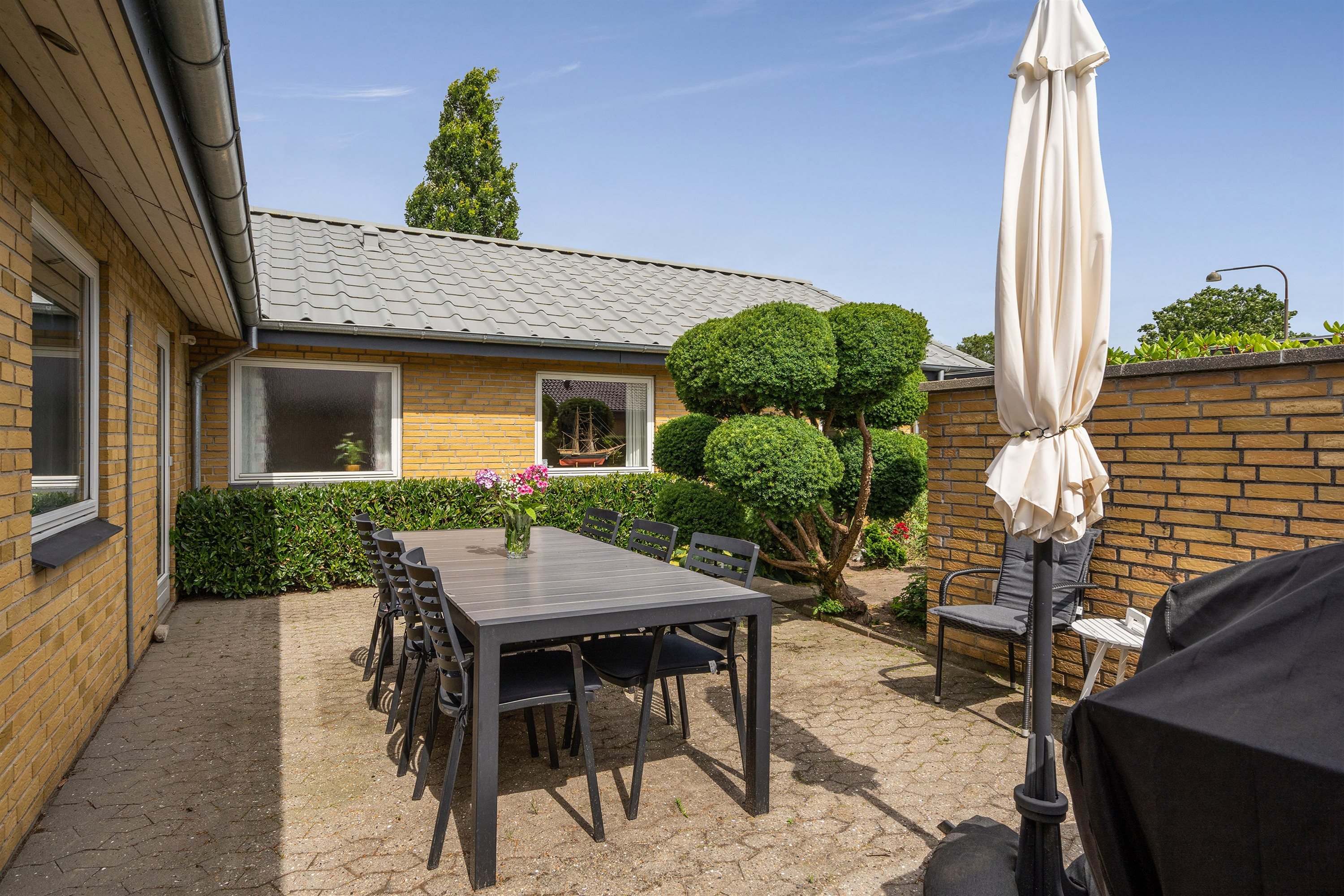 Fremhævet terrasse billede i fuldskærmstilstand. Billede af Fyrrevænget 215, 7190 Billund