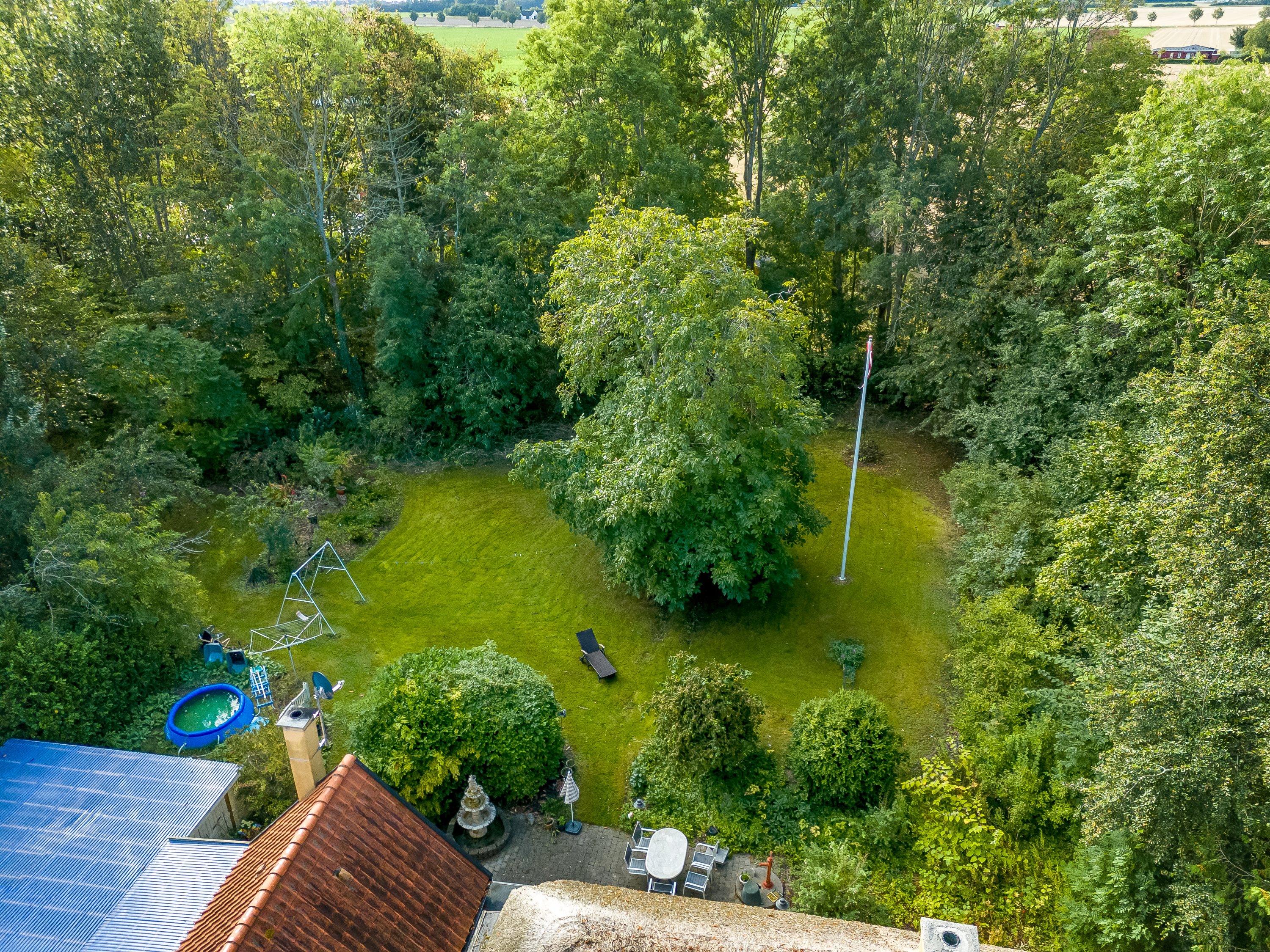 Fremhævet luftfoto billede i fuldskærmstilstand. Billede af Klønge Byvej 10, 4983 Dannemare