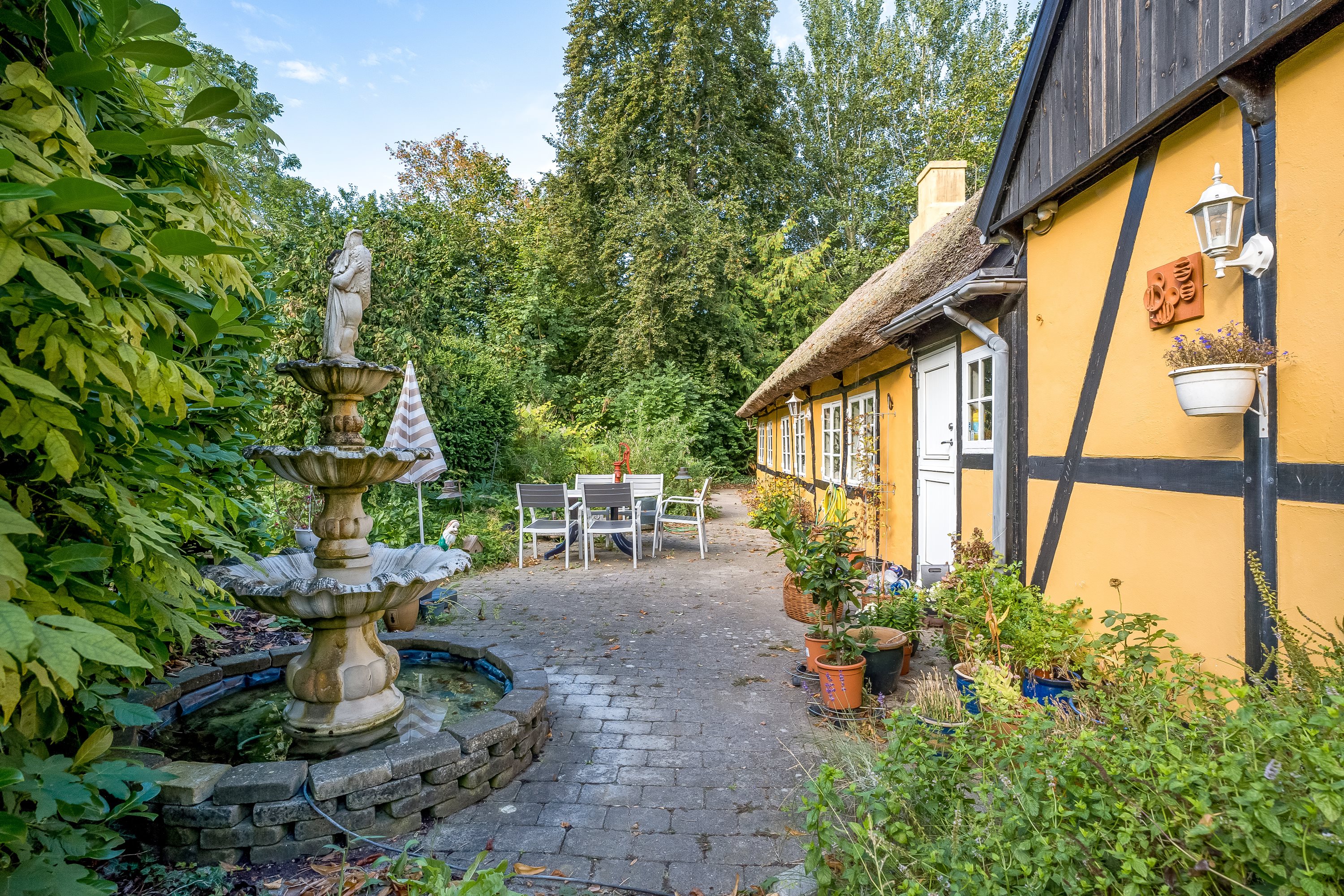 Fremhævet terrasse billede i fuldskærmstilstand. Billede af Klønge Byvej 10, 4983 Dannemare