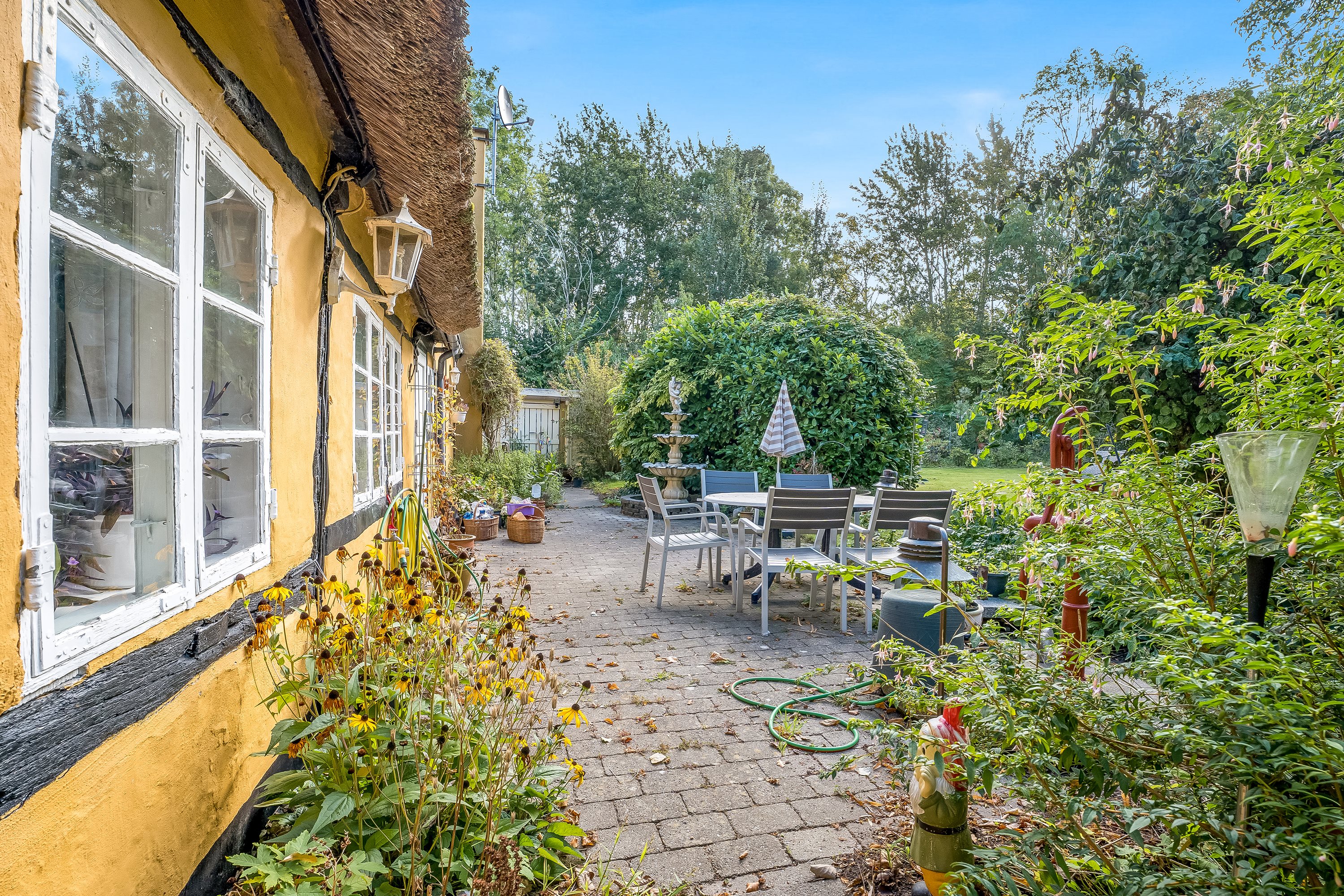 Fremhævet terrasse billede i fuldskærmstilstand. Billede af Klønge Byvej 10, 4983 Dannemare