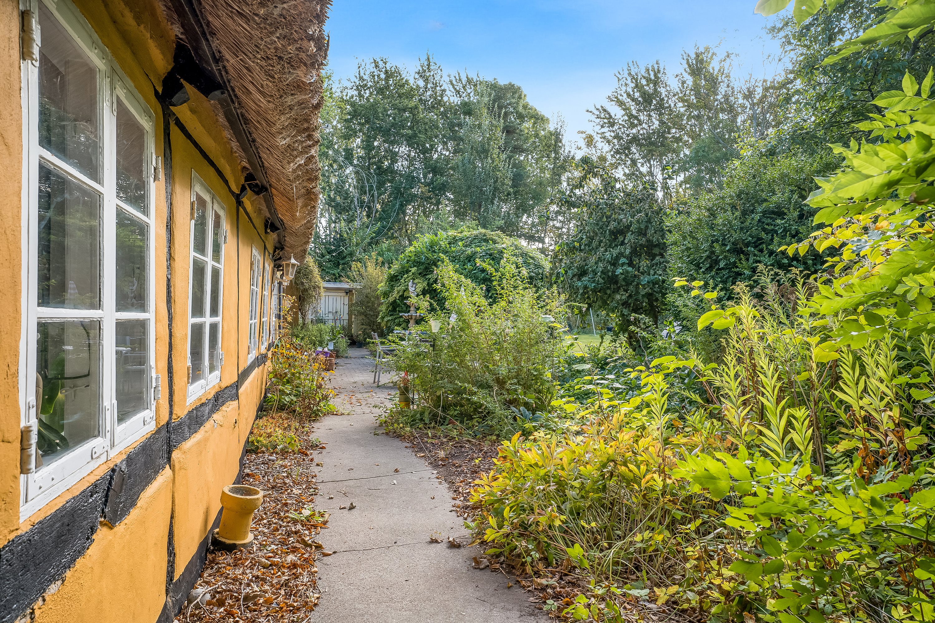 Fremhævet terrasse billede i fuldskærmstilstand. Billede af Klønge Byvej 10, 4983 Dannemare