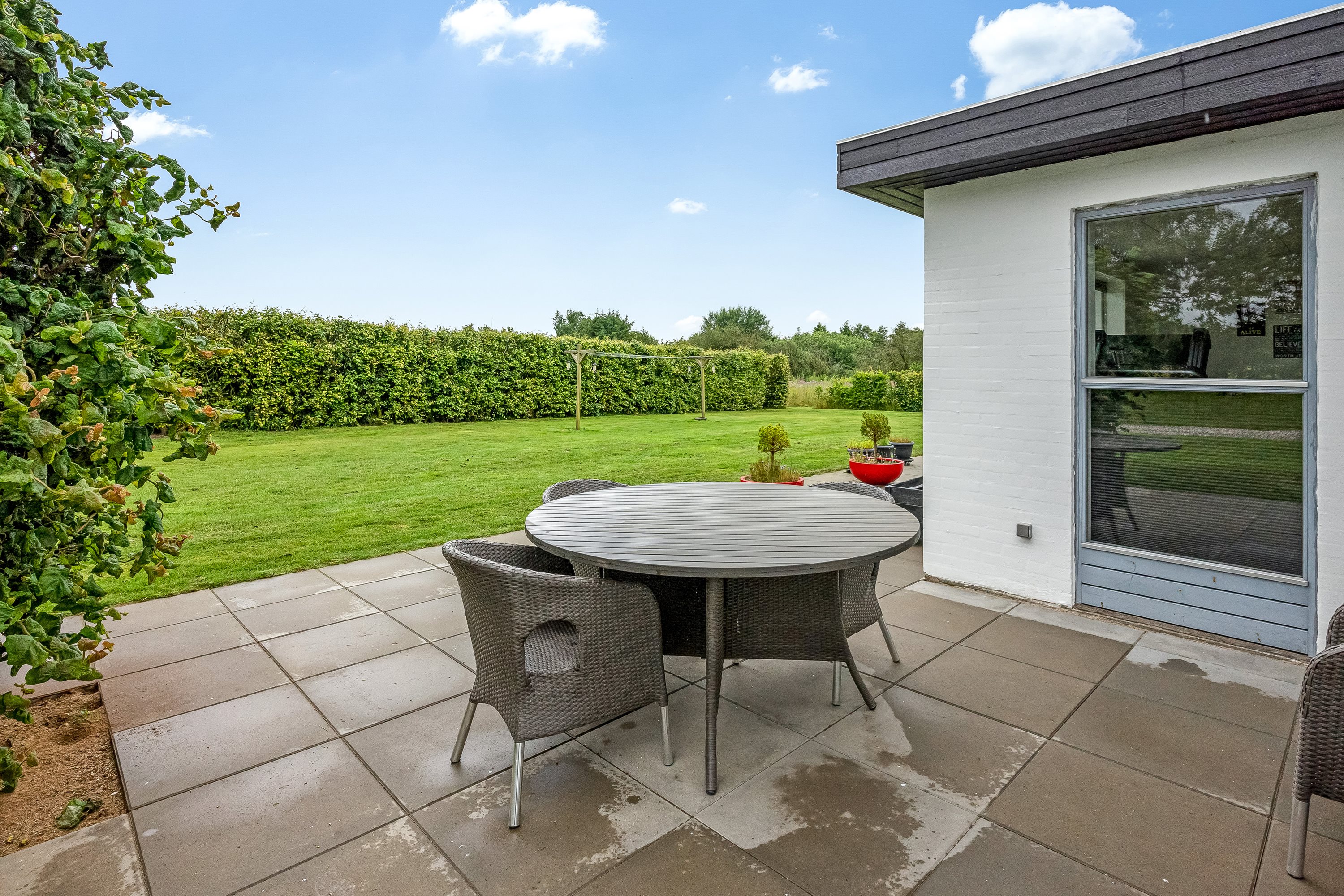 Fremhævet terrasse billede i fuldskærmstilstand. Billede af Nygårdsvej 22, 6940 Lem St