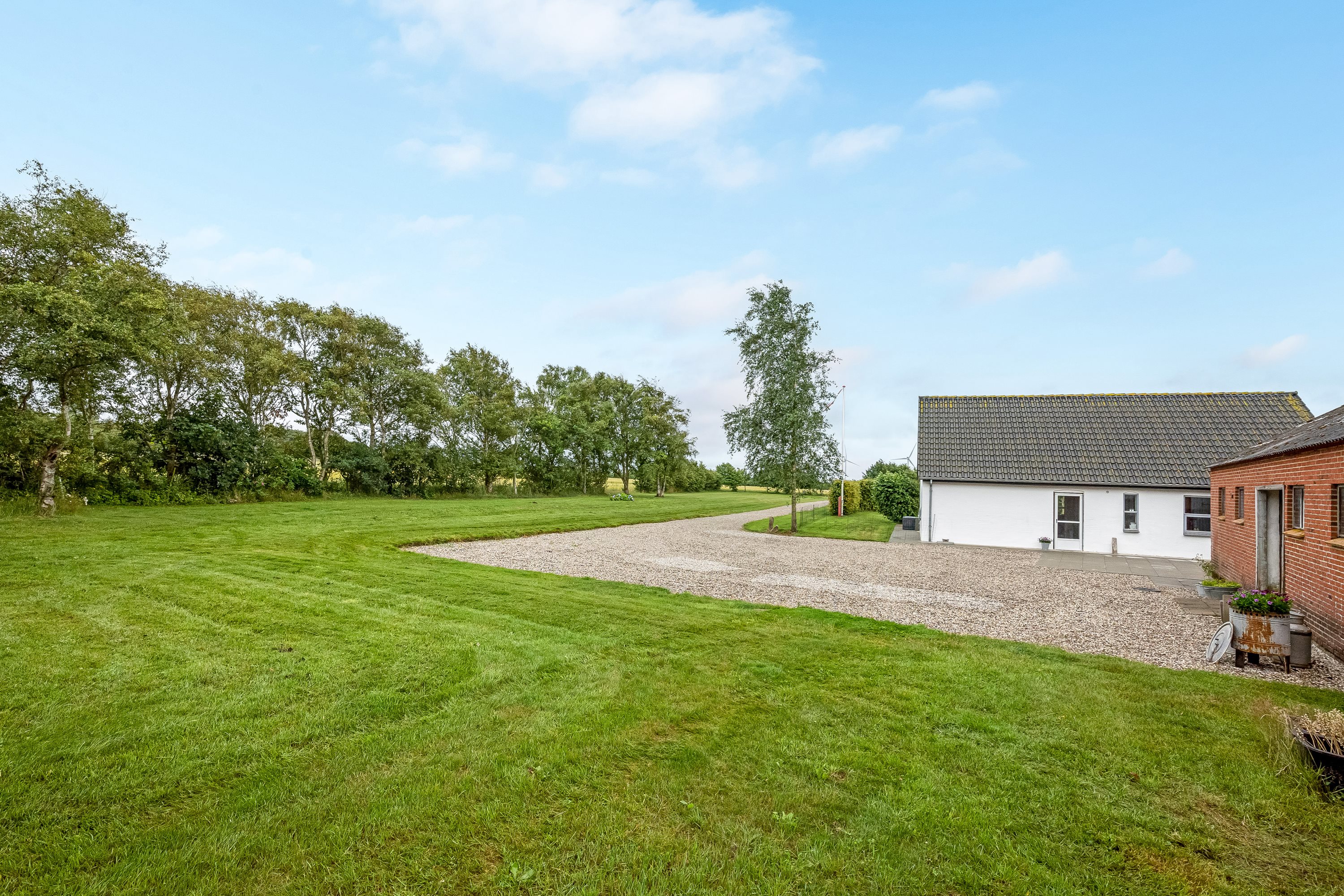 Fremhævet gårdsplads billede i fuldskærmstilstand. Billede af Nygårdsvej 22, 6940 Lem St