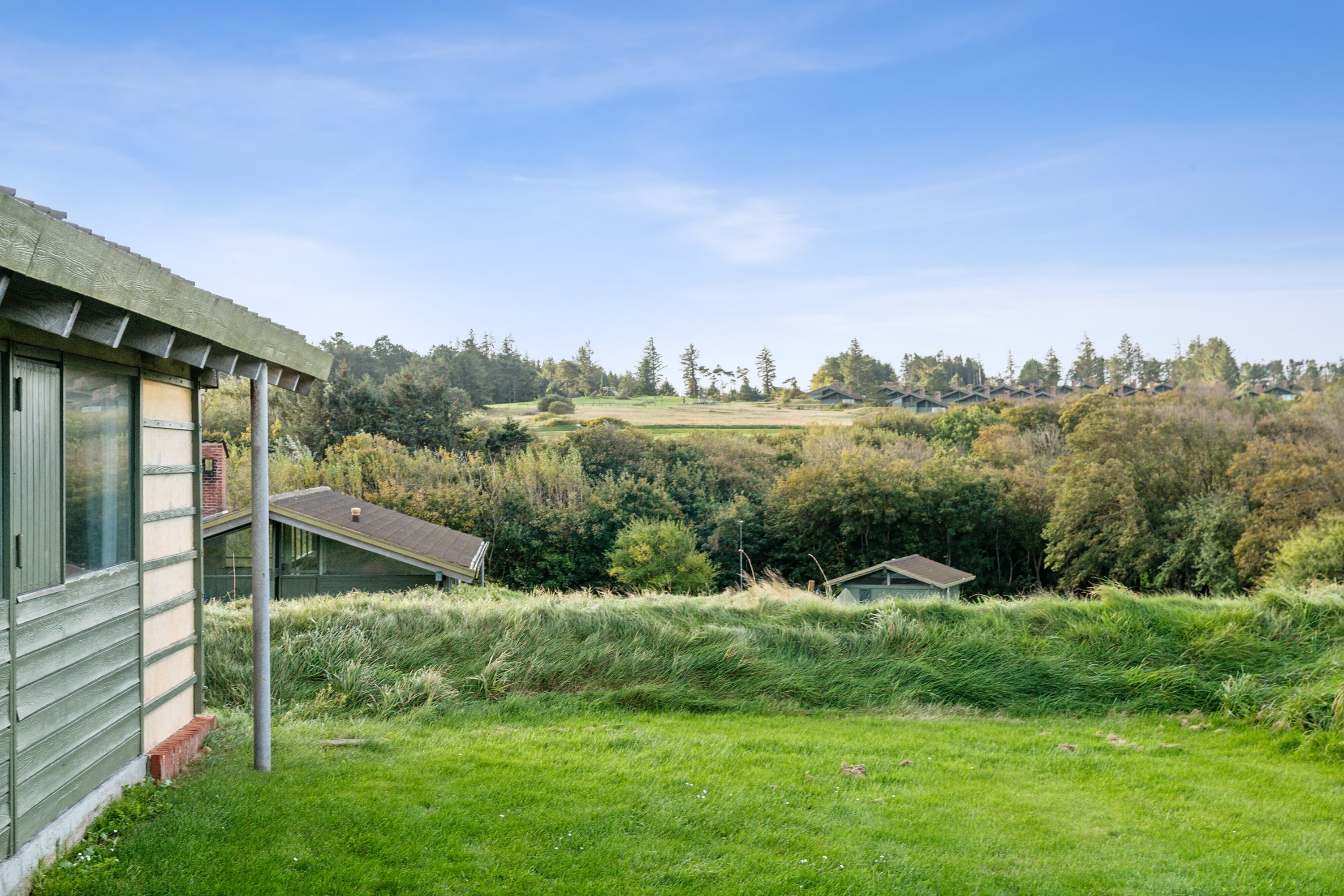 Fremhævet set fra haven billede i fuldskærmstilstand. Billede af Solskinsvej 58, Vigsø, 7730 Hanstholm