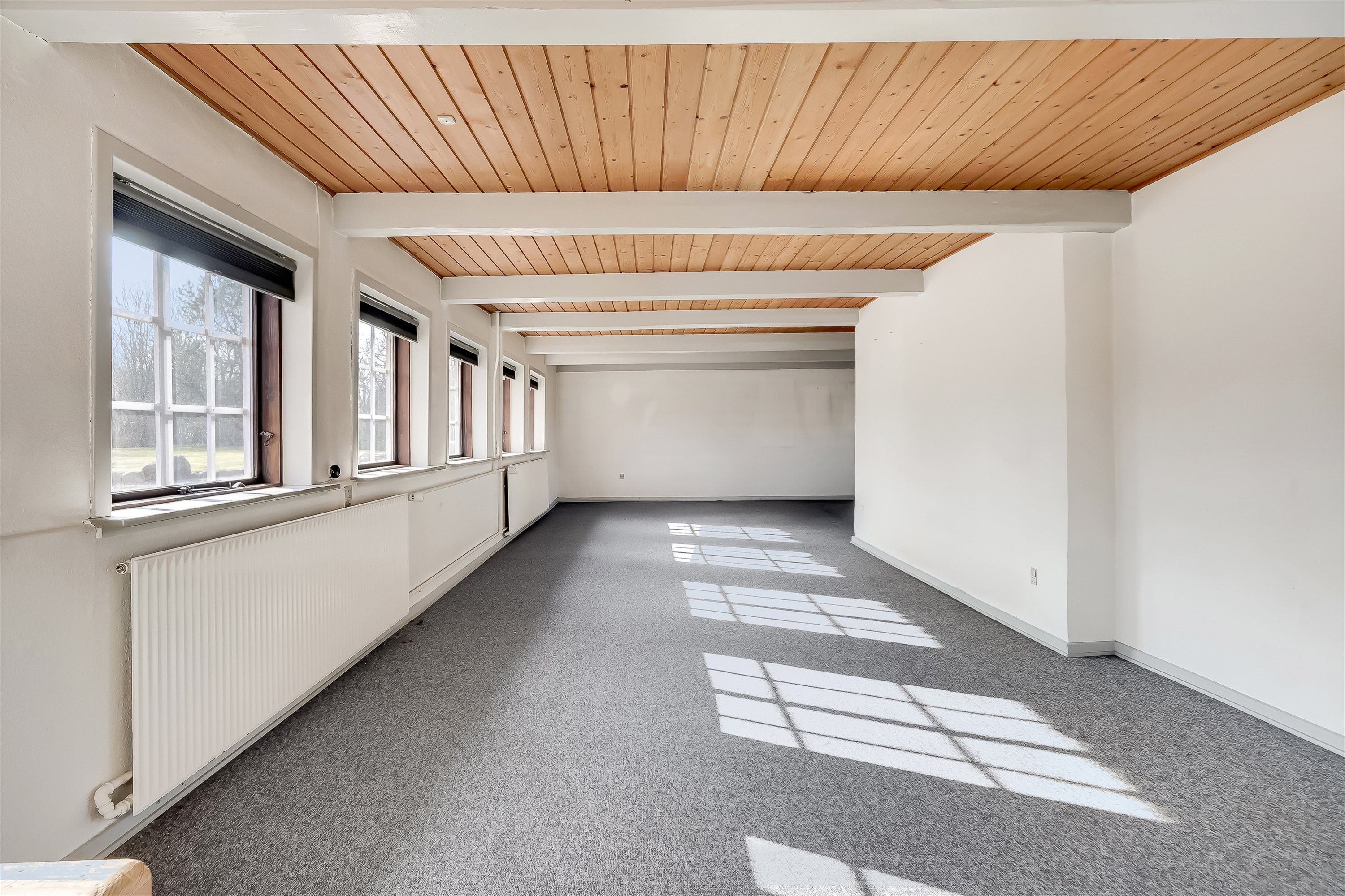 Fremhævet stue billede i fuldskærmstilstand. Billede af Sadderupvej 12, 6705 Esbjerg Ø