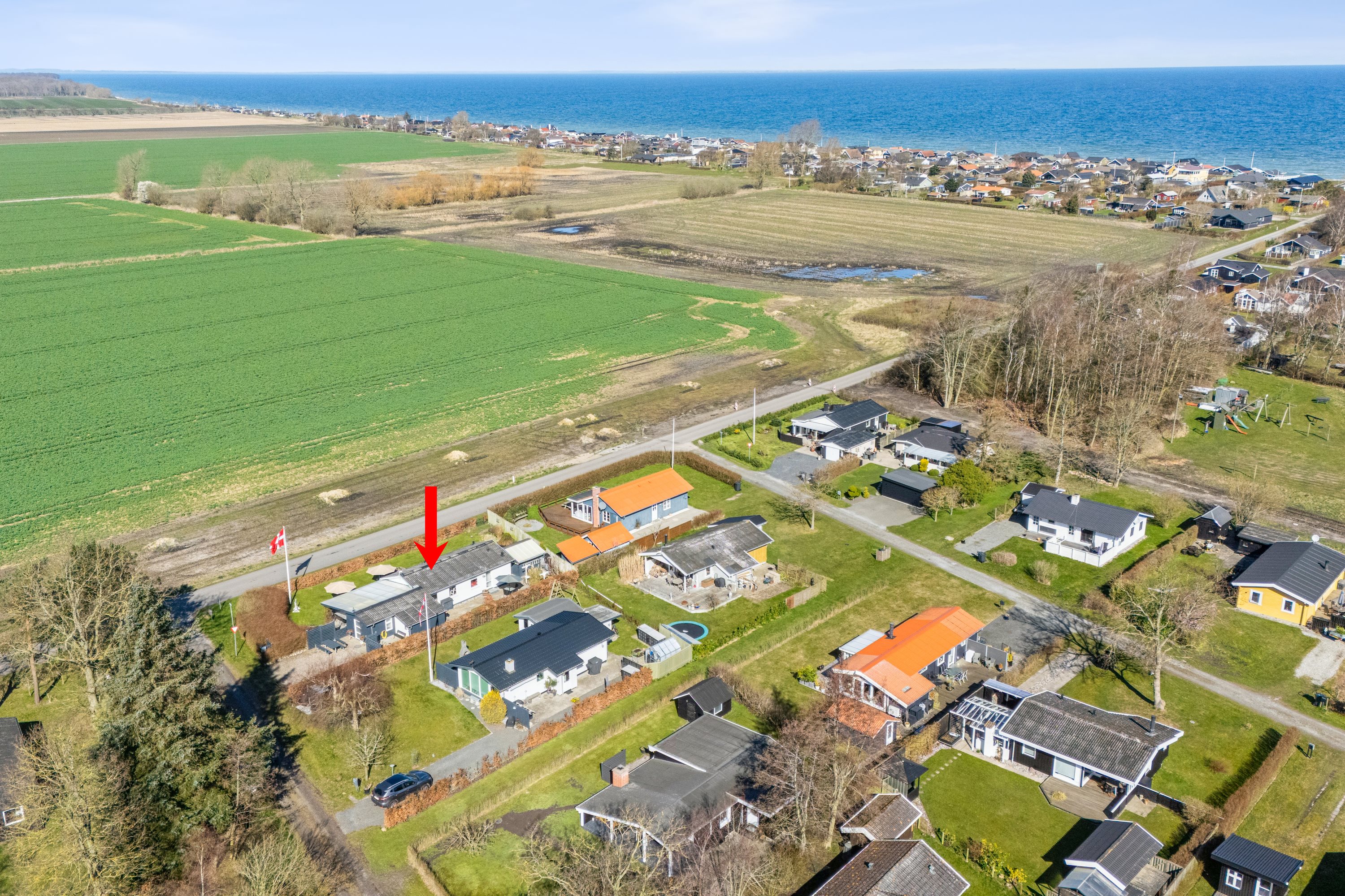 Fremhævet luftfoto billede i fuldskærmstilstand. Billede af Rønnevænget 15, Tørresø Strand, 5450 Otterup