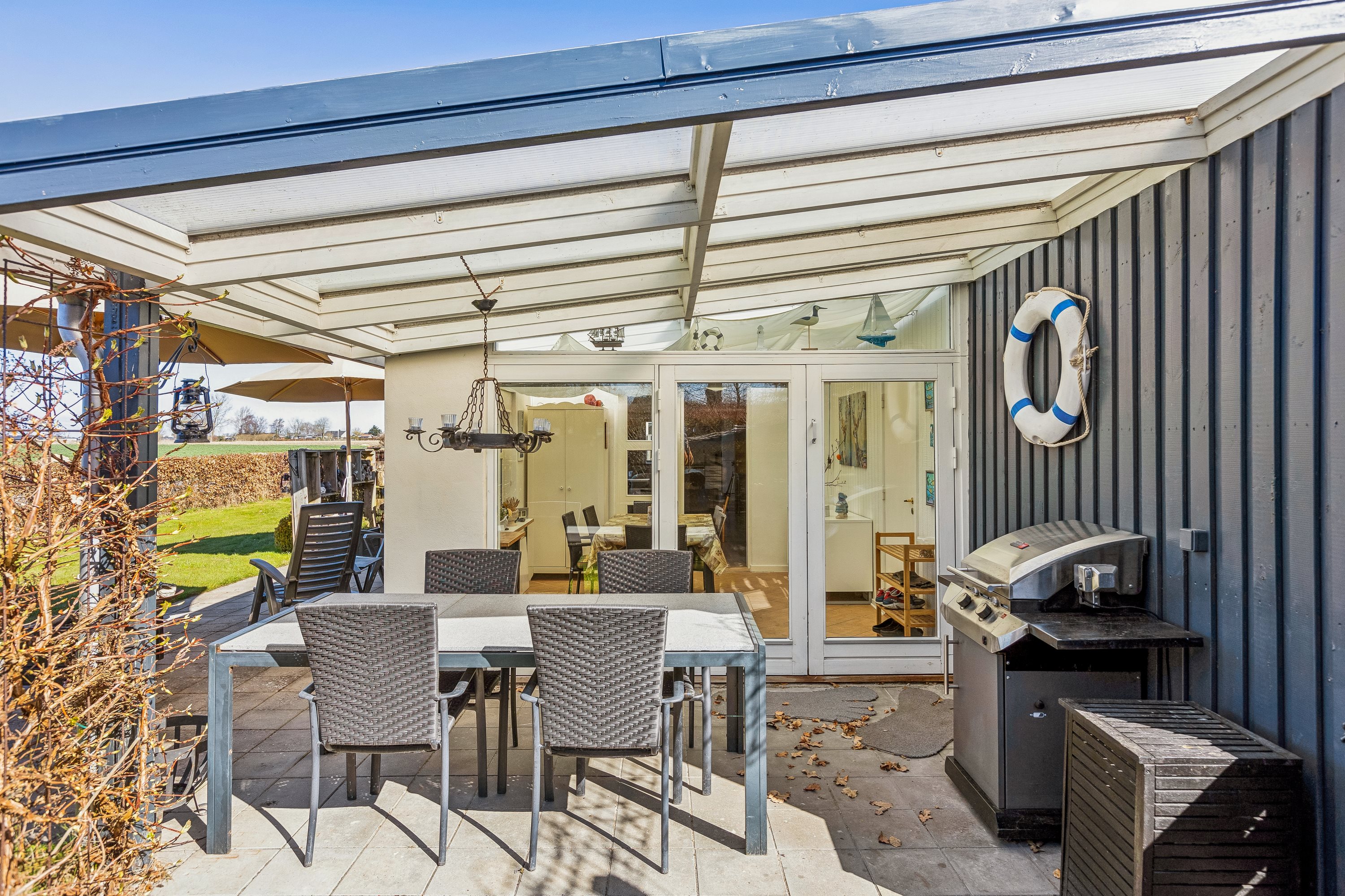 Fremhævet terrasse billede i fuldskærmstilstand. Billede af Rønnevænget 15, Tørresø Strand, 5450 Otterup