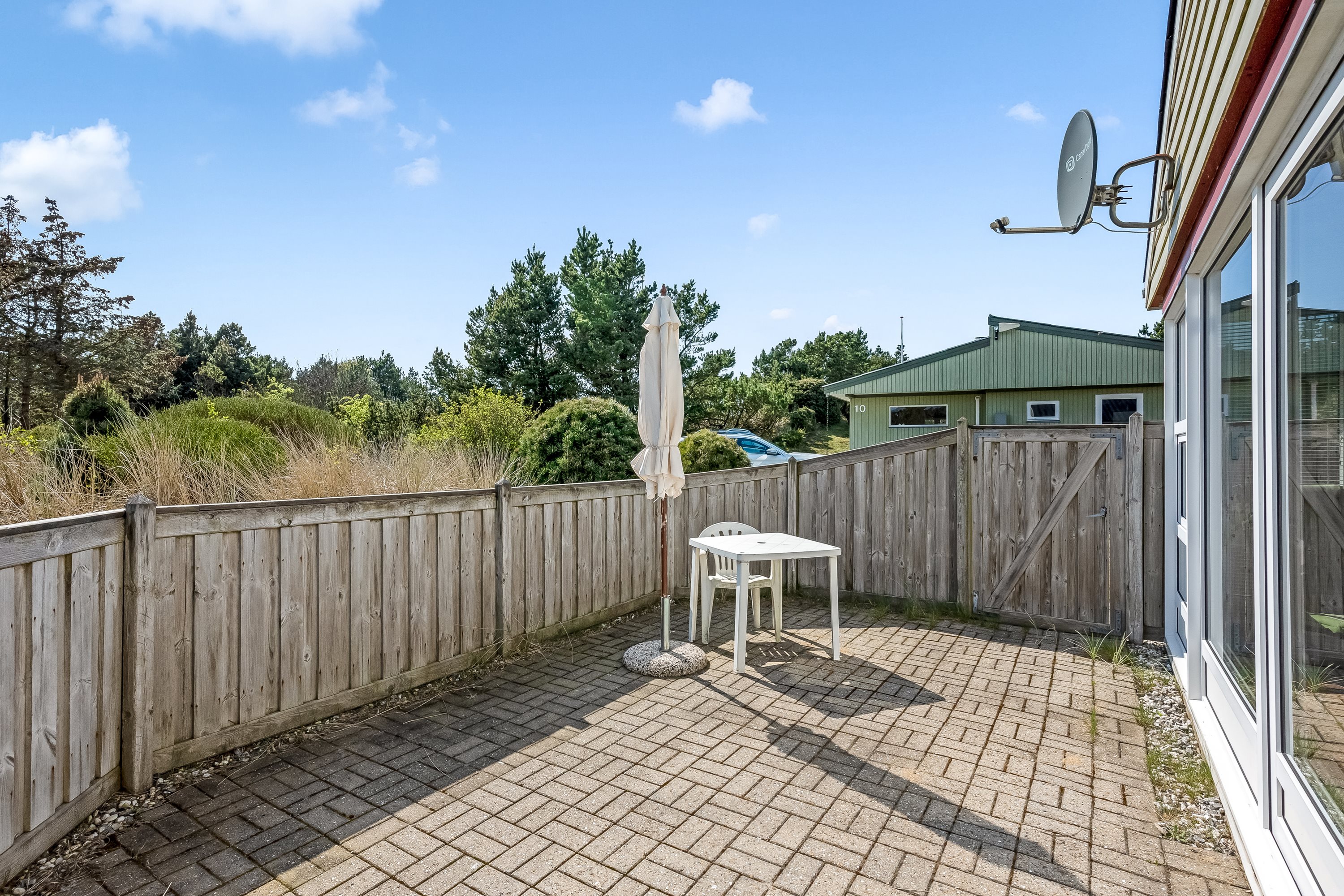 Fremhævet terrasse billede i fuldskærmstilstand. Billede af Holmsborgvej 8, Søndervig, 6950 Ringkøbing