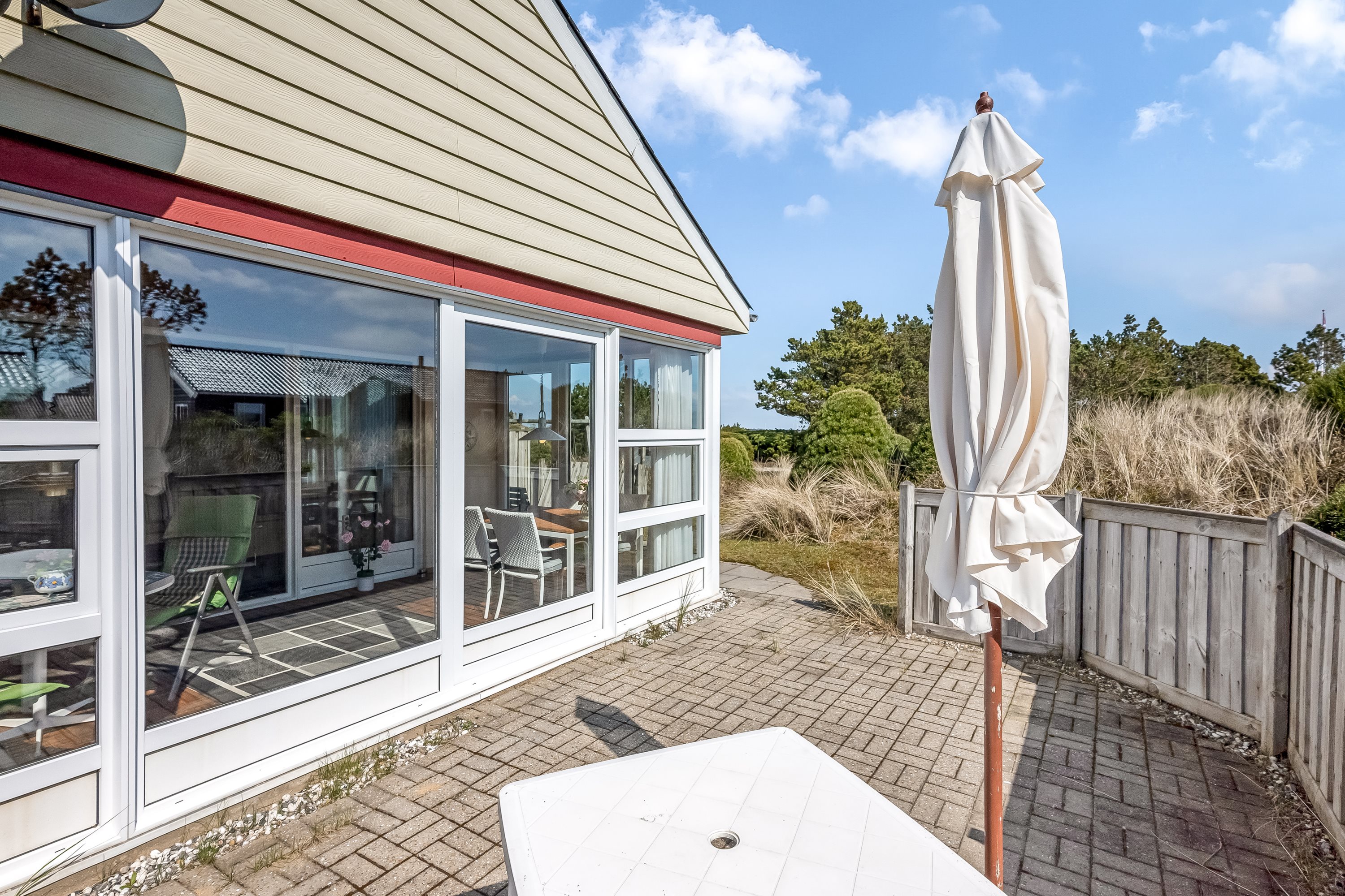 Fremhævet terrasse billede i fuldskærmstilstand. Billede af Holmsborgvej 8, Søndervig, 6950 Ringkøbing