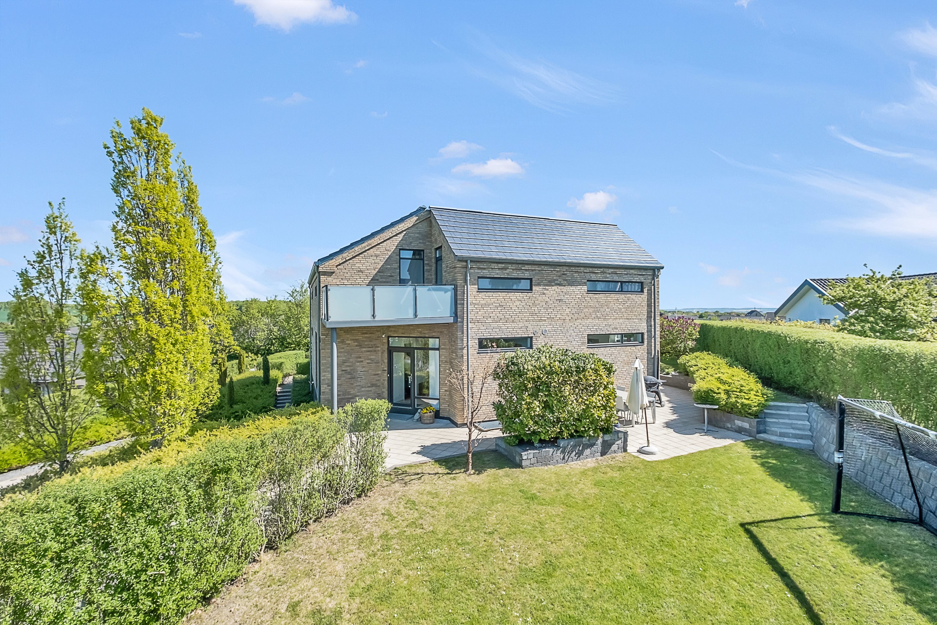 Fremhævet facade billede i fuldskærmstilstand. Billede af Asmusgårdsvej 38, 8520 Lystrup