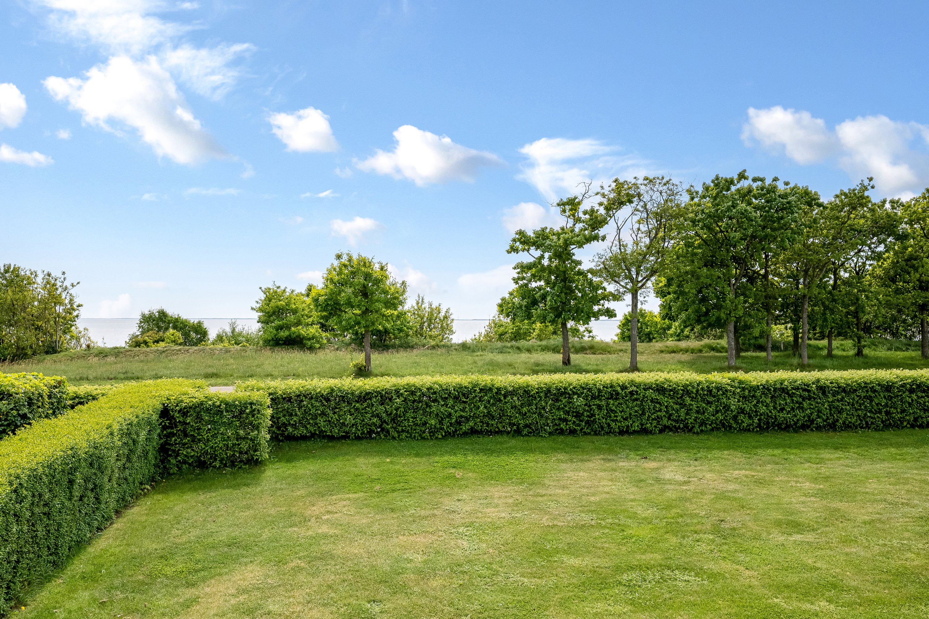Fremhævet have billede i fuldskærmstilstand. Billede af Heboltoft 38, Velling, 6950 Ringkøbing