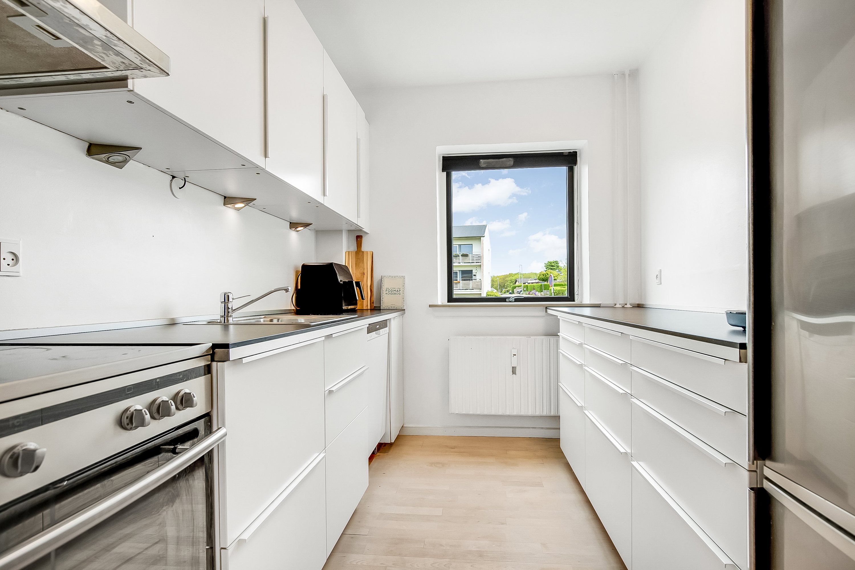 Fremhævet køkken billede i fuldskærmstilstand. Billede af Arne Poulsens Vej 1, st.. th., 7100 Vejle