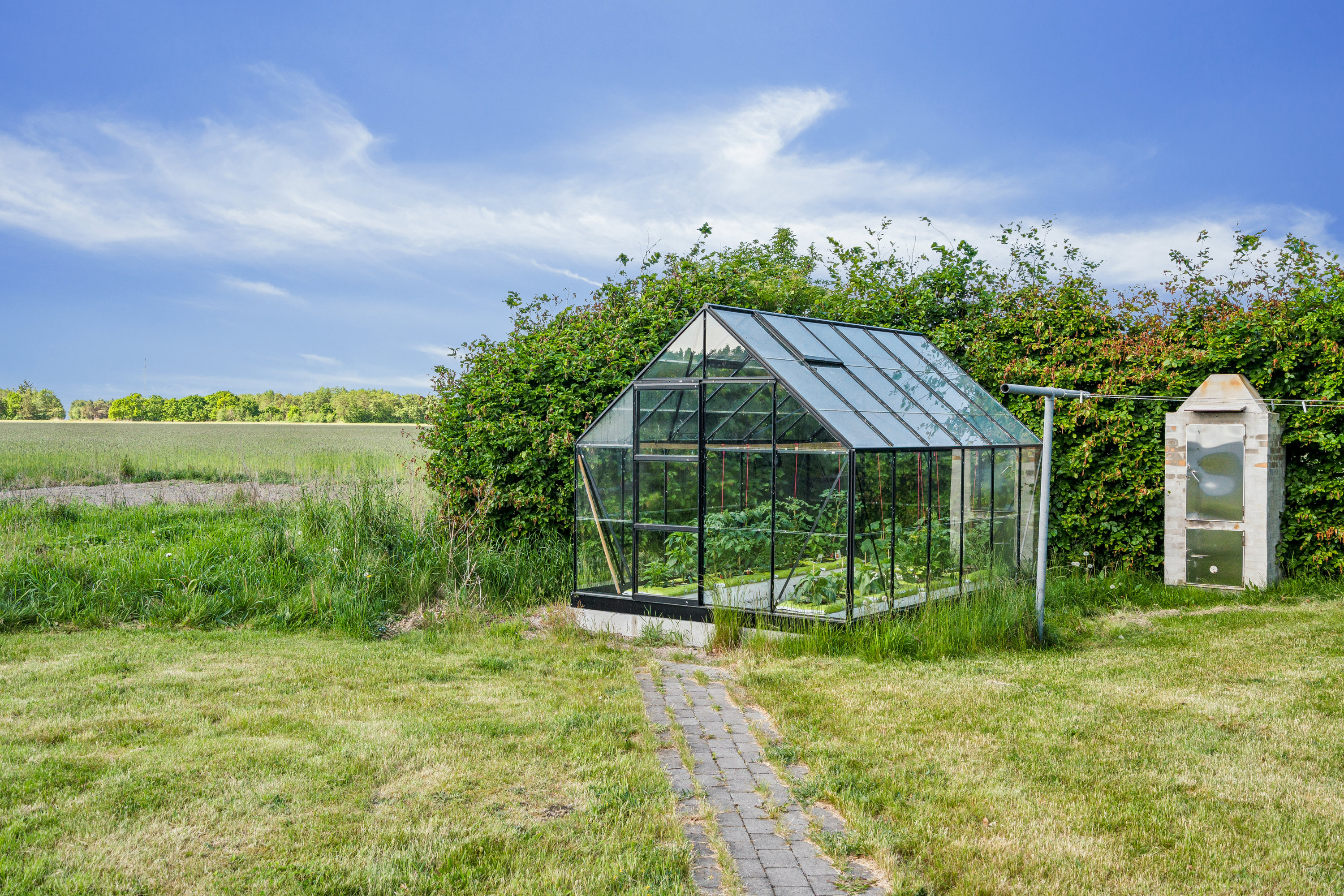 Fremhævet have billede i fuldskærmstilstand. Billede af Tørkerivej 7, Byrum, 9940 Læsø