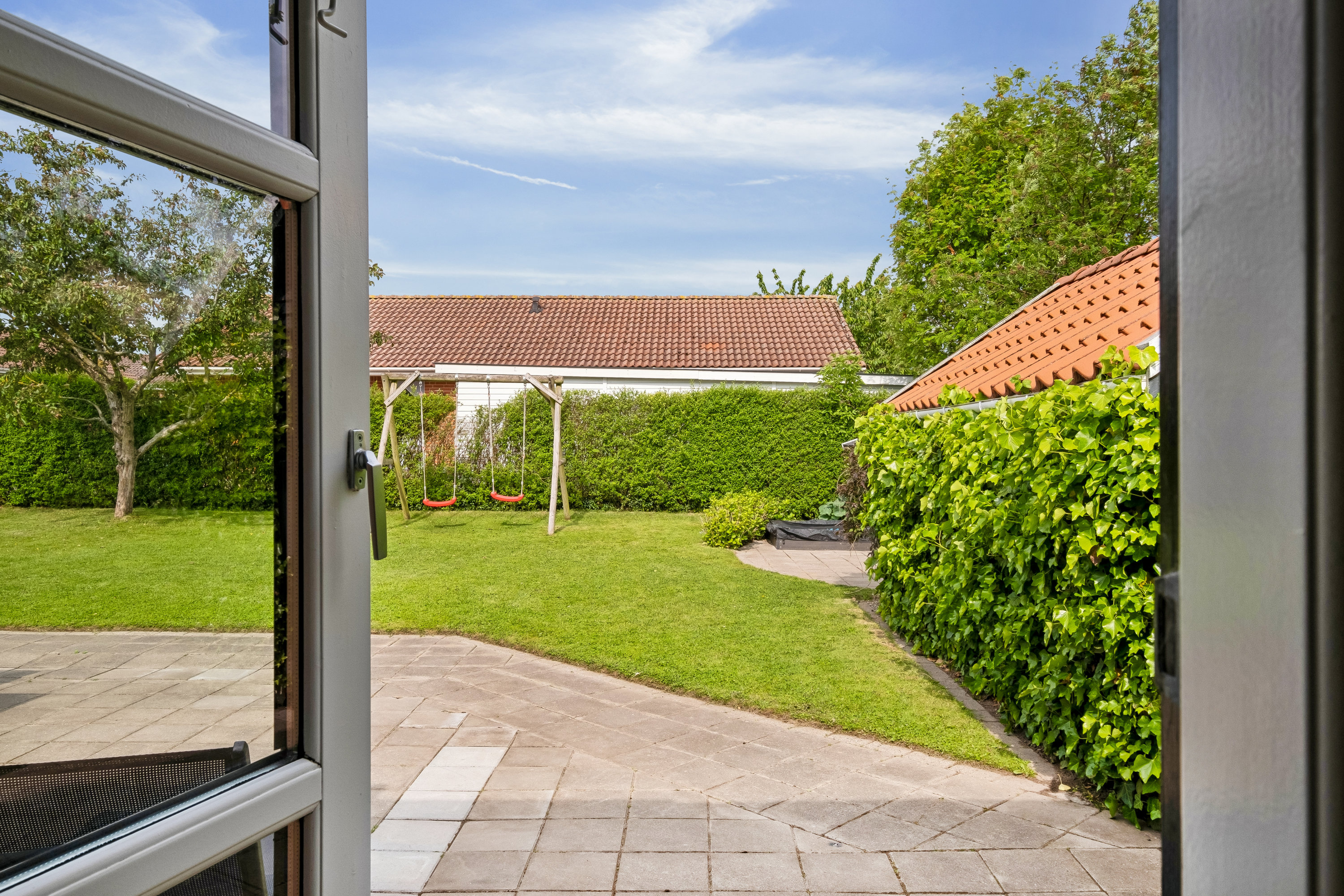 Fremhævet kig til haven billede i fuldskærmstilstand. Billede af Charlotteparken 59, Stensballe, 8700 Horsens