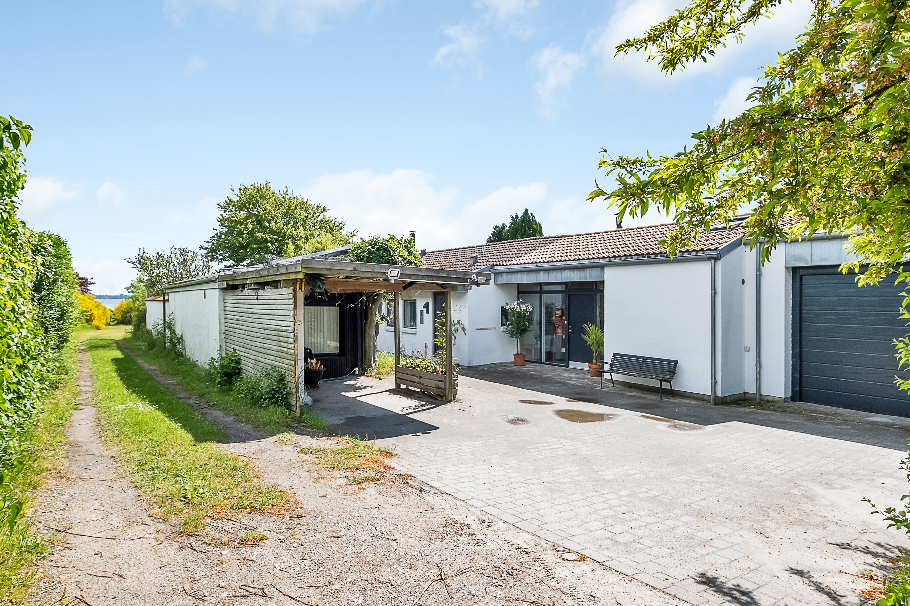 Fremhævet facade billede i fuldskærmstilstand. Billede af Strandvangsvej 116, 8250 Egå