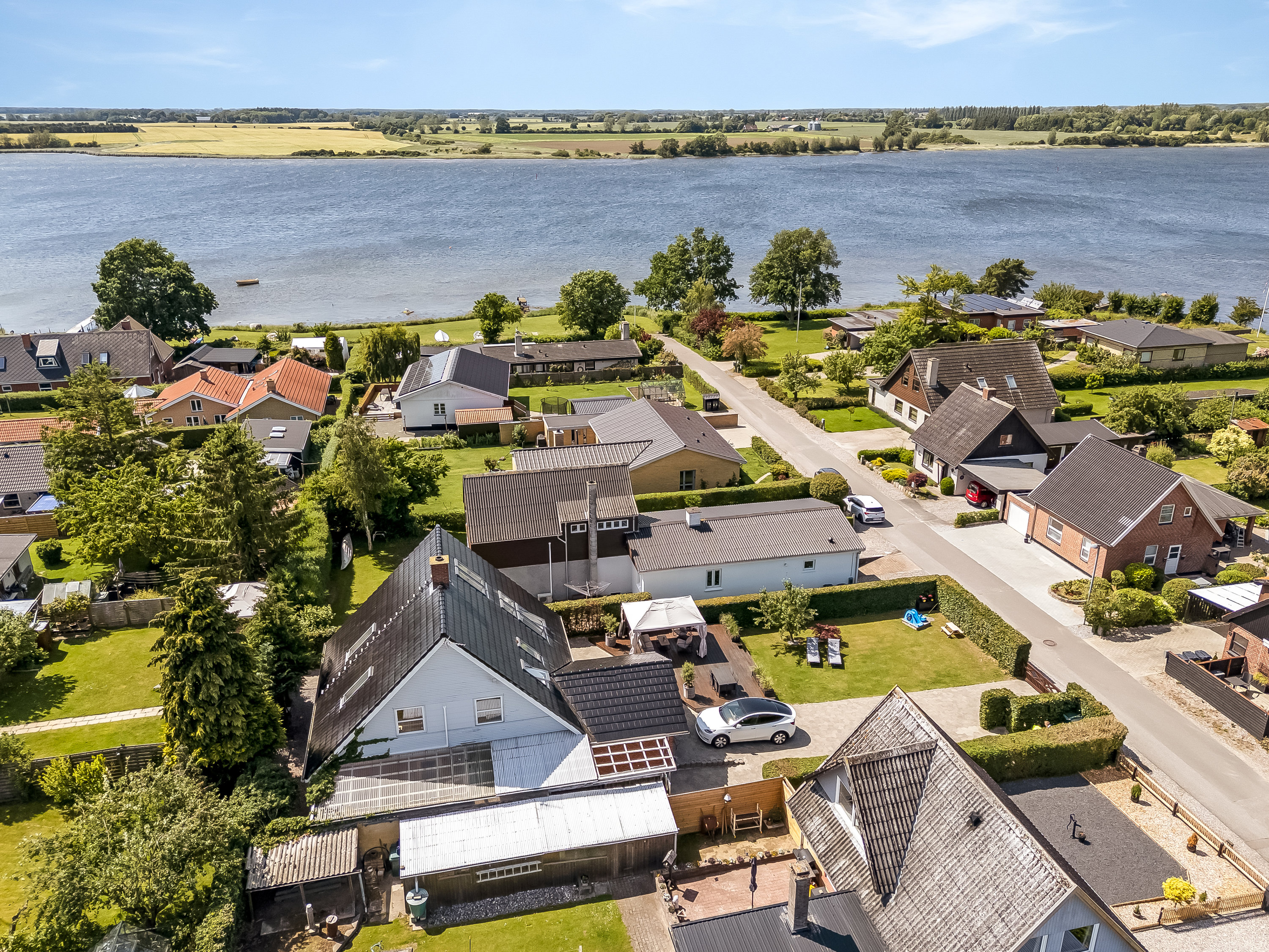 Fremhævet luftfoto billede i fuldskærmstilstand. Billede af Hasselø Strandvej 9, Hasselø Pl, 4800 Nykøbing F