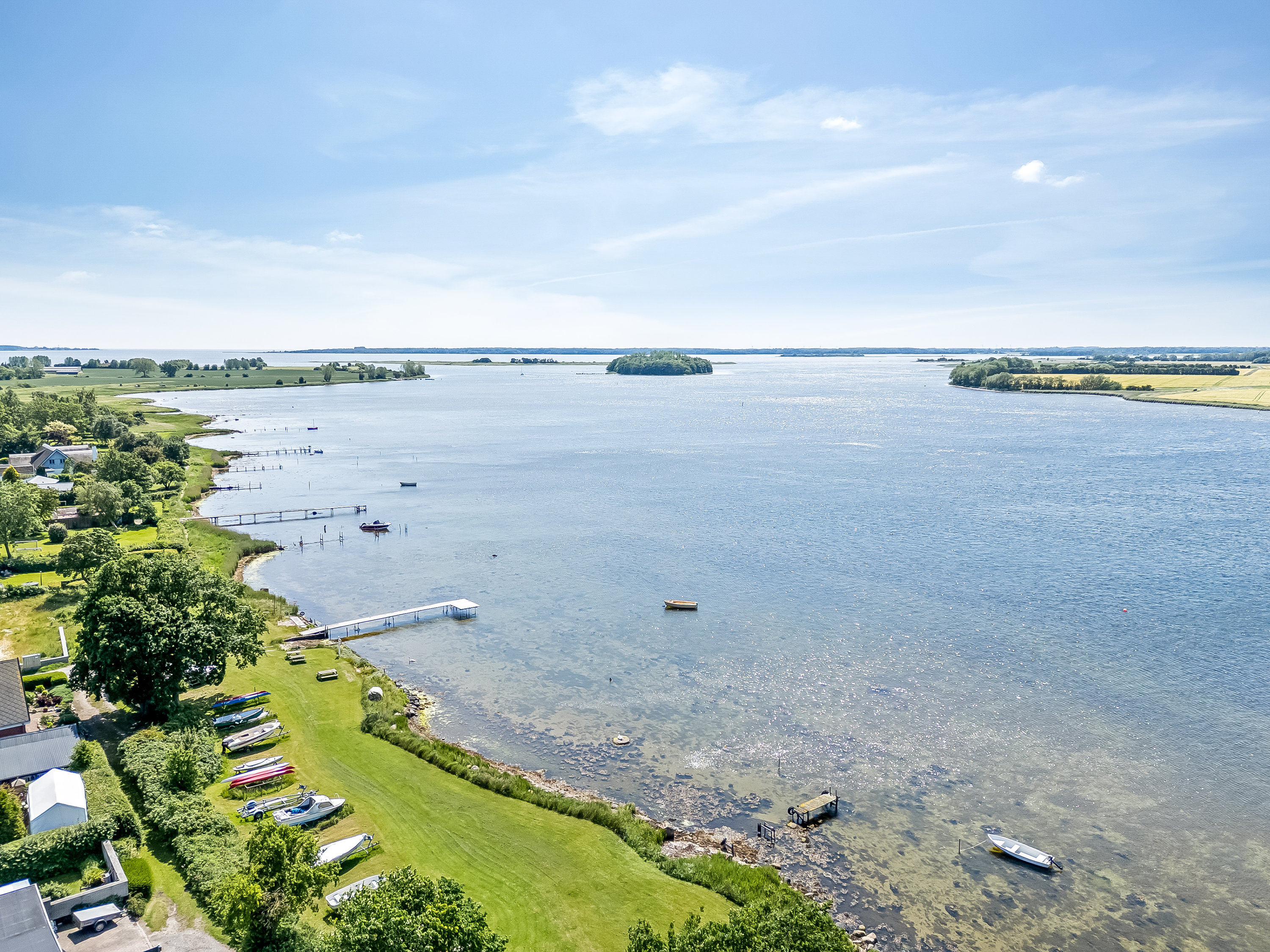 Fremhævet luftfoto billede i fuldskærmstilstand. Billede af Hasselø Strandvej 9, Hasselø Pl, 4800 Nykøbing F