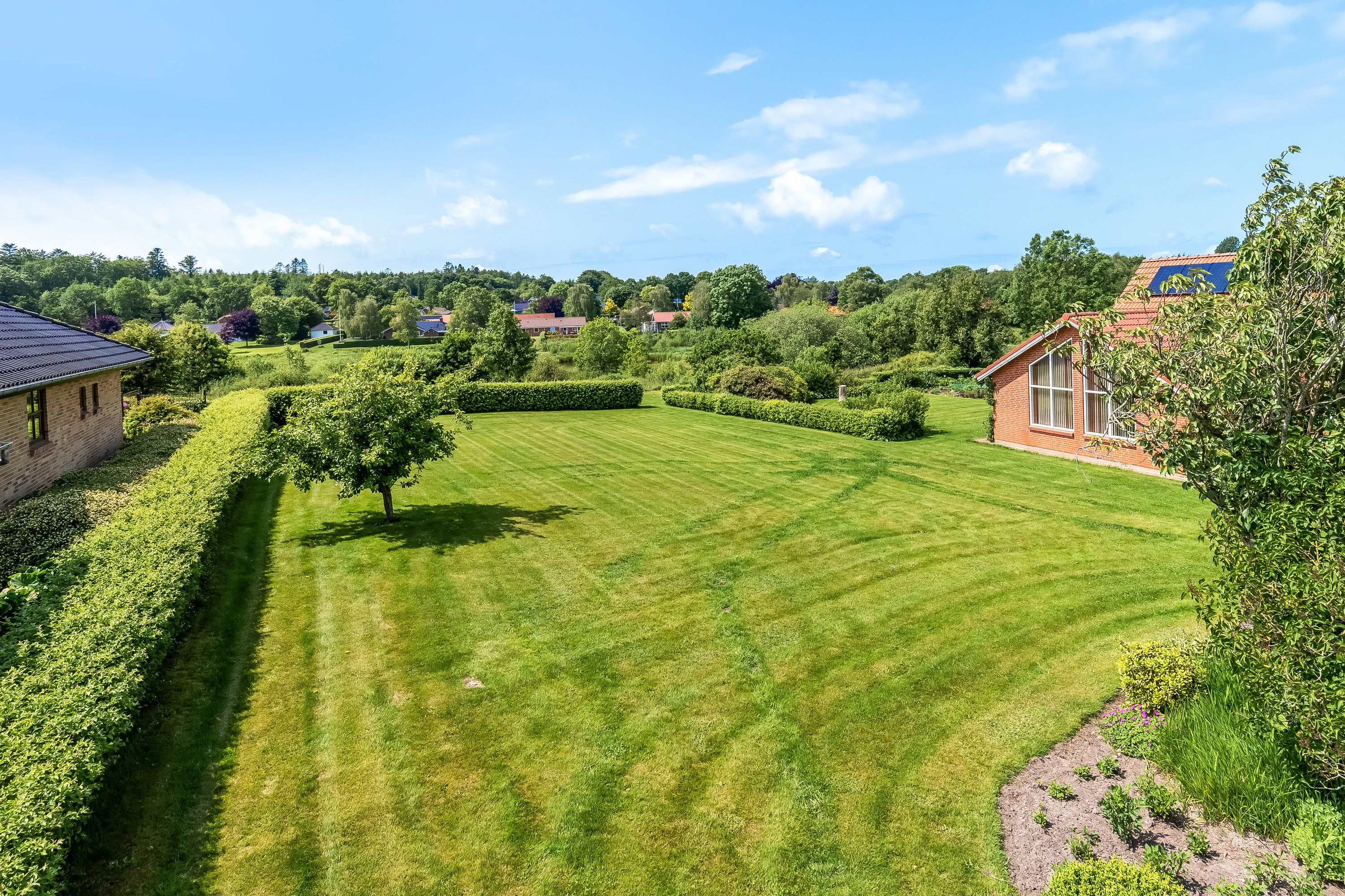 Fremhævet grund billede i fuldskærmstilstand. Billede af Grønningen 16, 7550 Sørvad