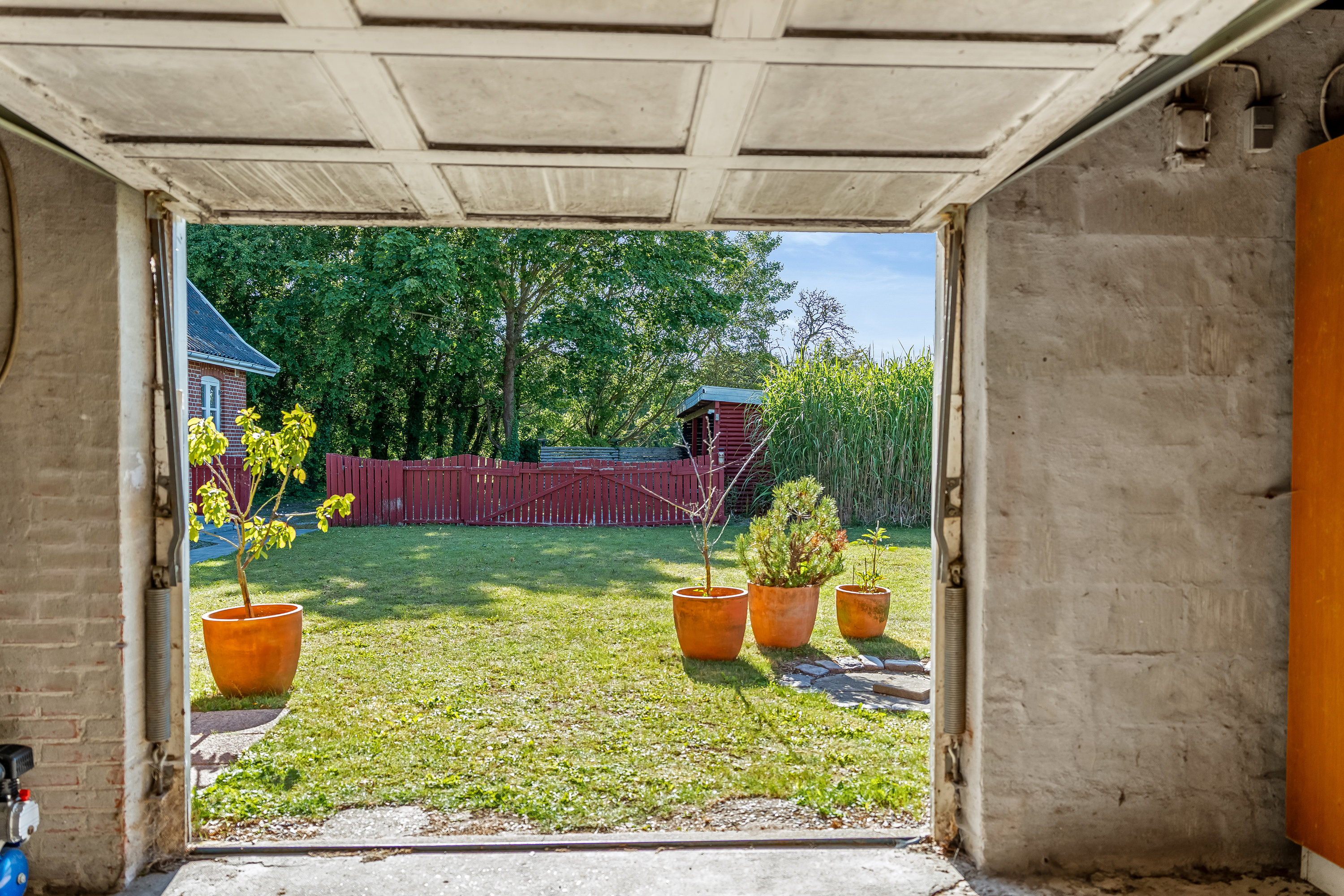 Fremhævet garage billede i fuldskærmstilstand. Billede af Tillitse Kirkevej 5, 4983 Dannemare