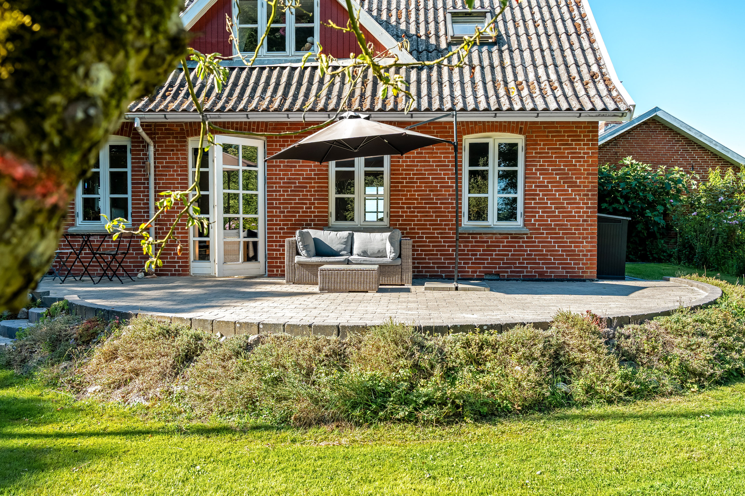 Fremhævet terrasse billede i fuldskærmstilstand. Billede af Tillitse Kirkevej 5, 4983 Dannemare