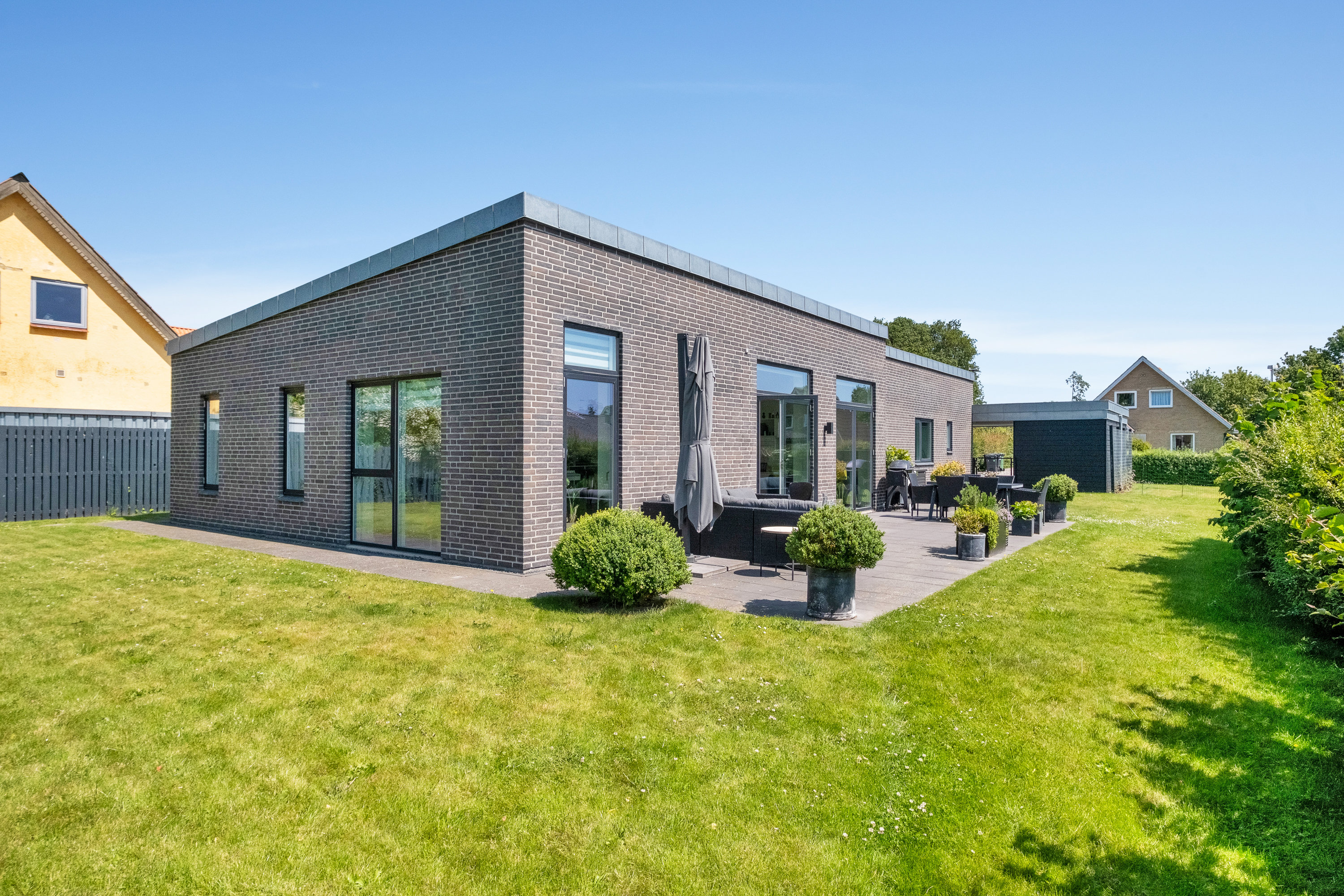 Villa: Set fra haven på Engvangen 11, 8520 Lystrup