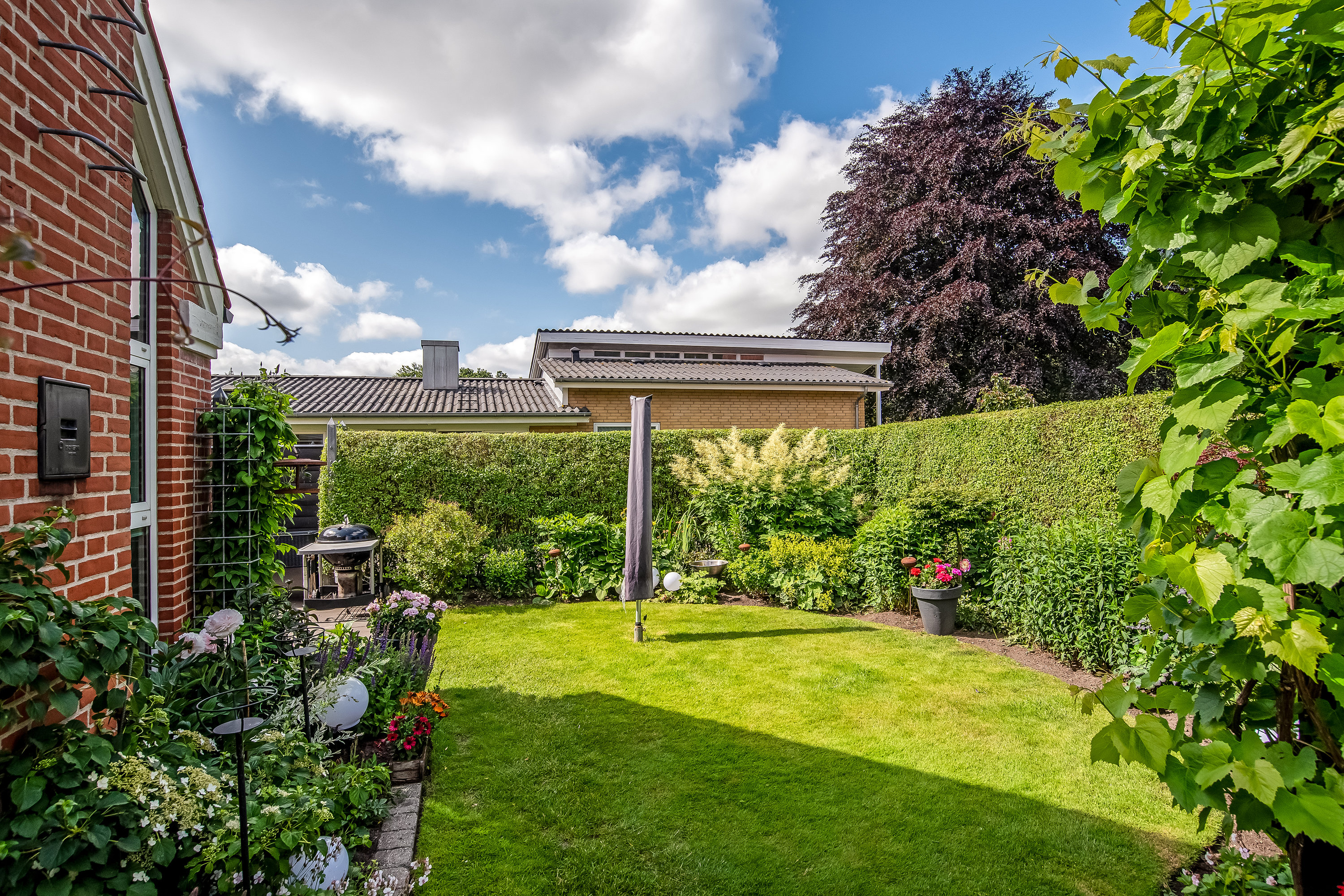 Fremhævet baghave billede i fuldskærmstilstand. Billede af Skjernvej 112A, 7500 Holstebro