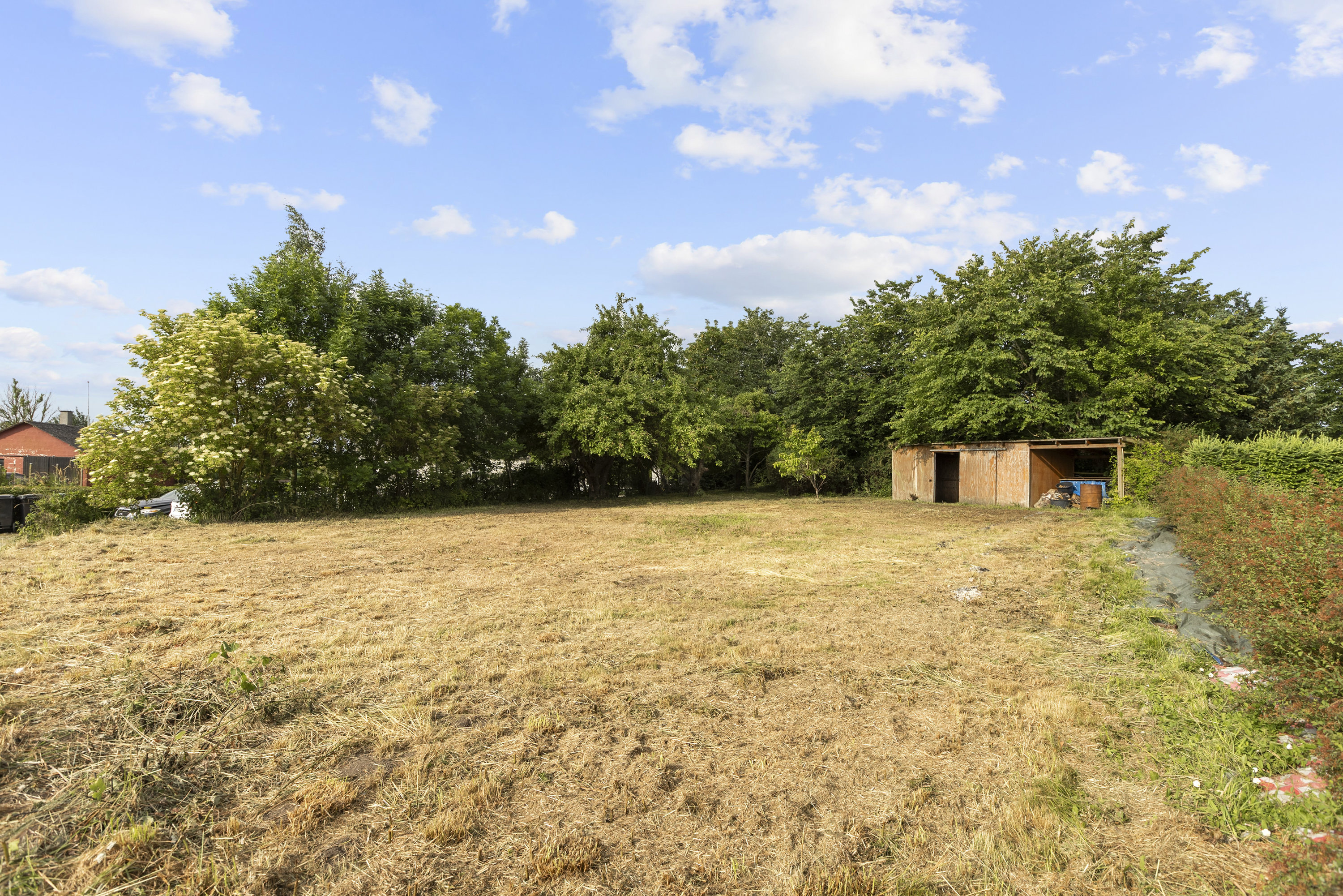 Fremhævet grund billede i fuldskærmstilstand. Billede af Zakarias Nielsensvej 2A, Øster Stillinge, 4200 Slagelse