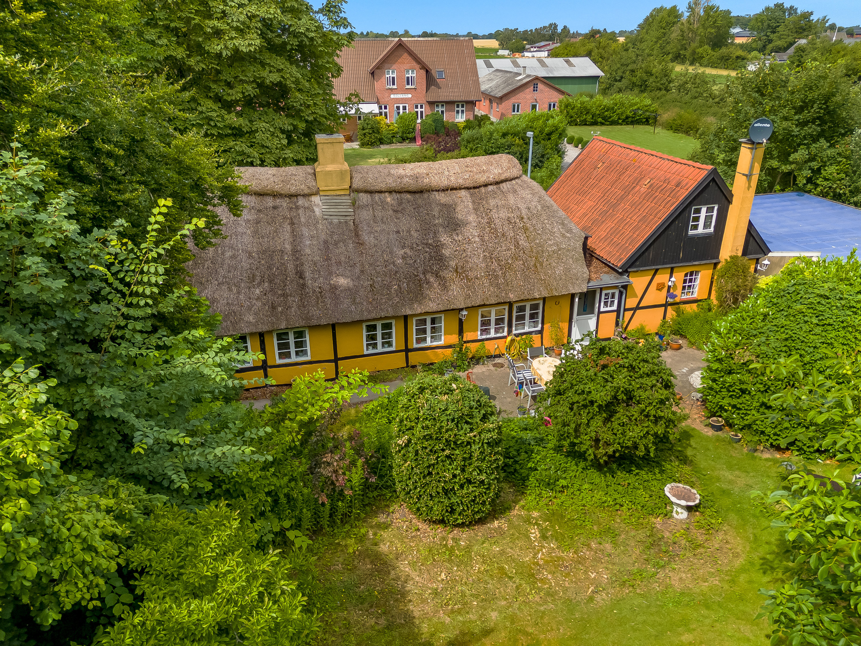 Fremhævet luftfoto billede i fuldskærmstilstand. Billede af Klønge Byvej 10, 4983 Dannemare