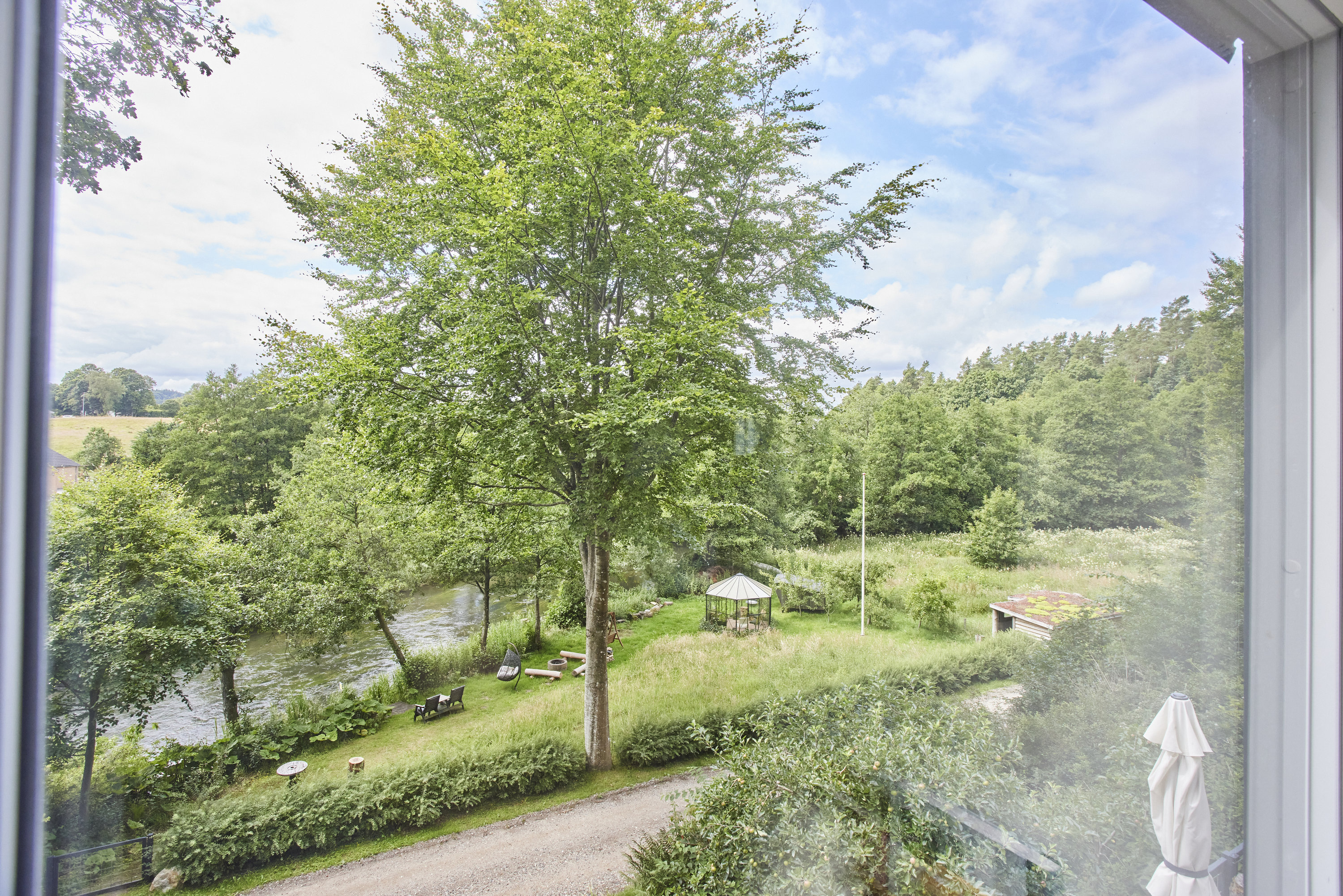 Fremhævet udsigt billede i fuldskærmstilstand. Billede af Højlundvej 4, Voervadsbro, 8660 Skanderborg