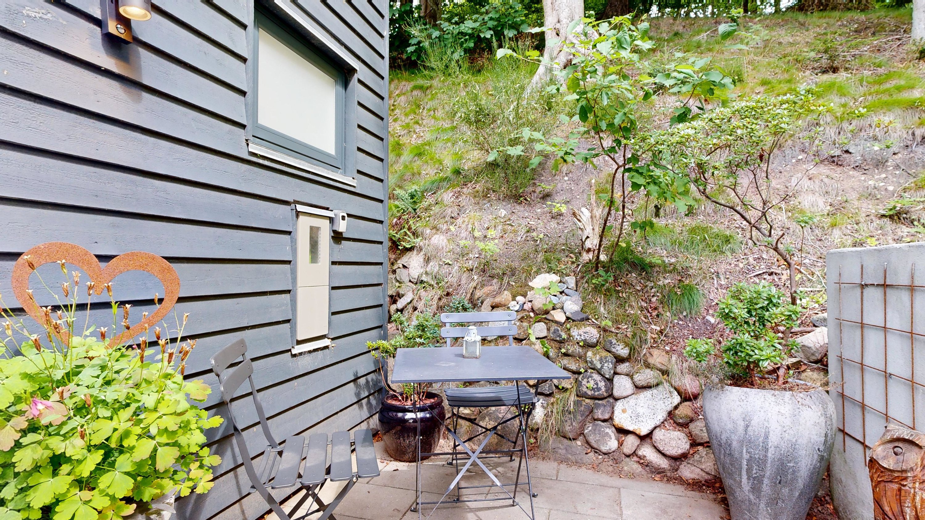 Fremhævet terrasse billede i fuldskærmstilstand. Billede af Højlundvej 4, Voervadsbro, 8660 Skanderborg