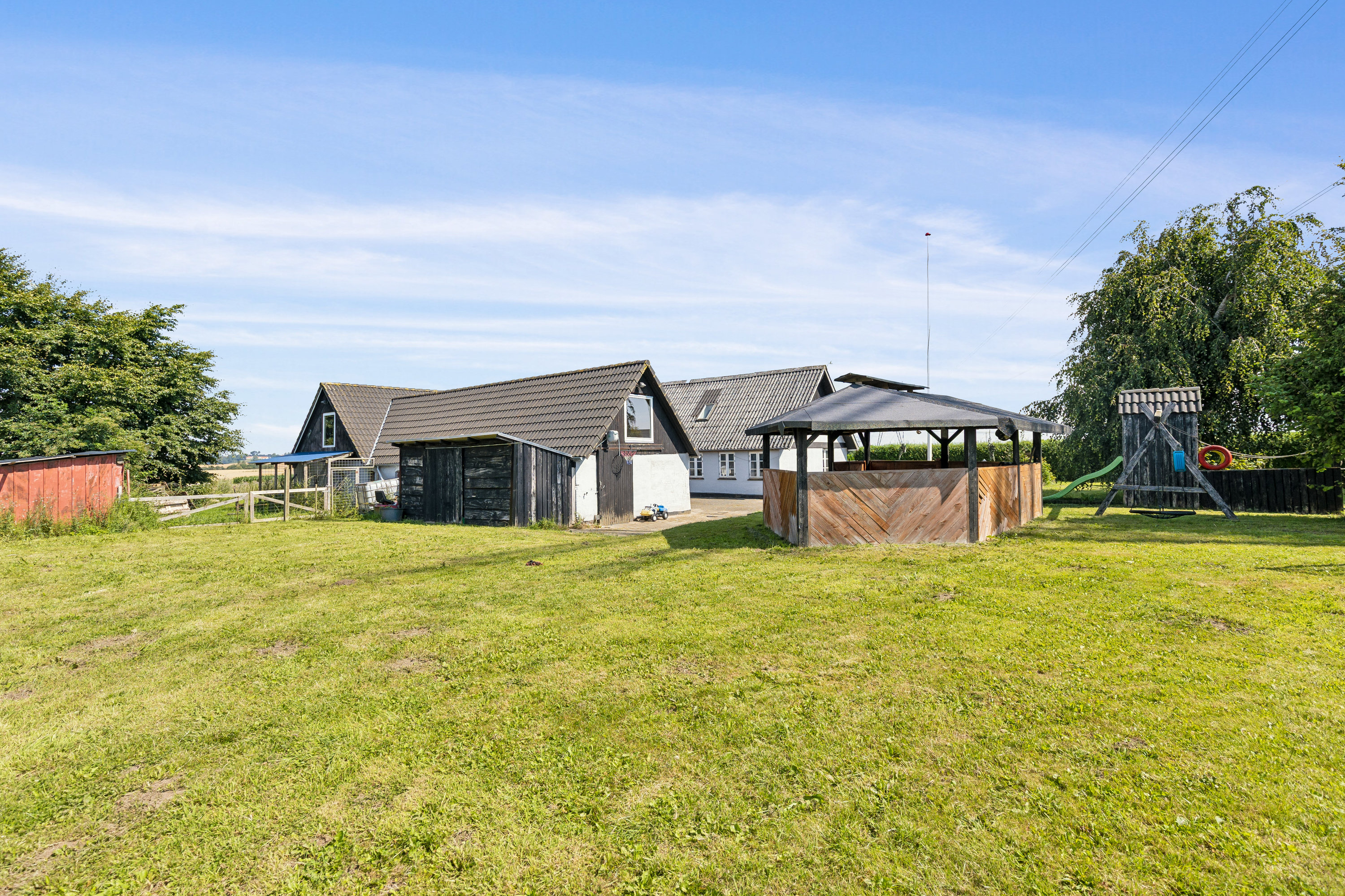 Fremhævet set fra haven billede i fuldskærmstilstand. Billede af Grønhøjvej 49, Hatting, 8700 Horsens