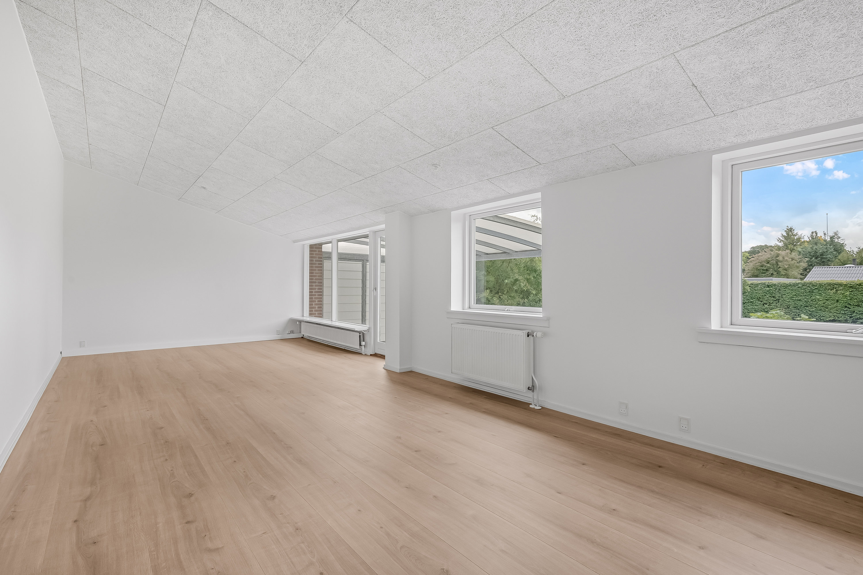 Fremhævet stue billede i fuldskærmstilstand. Billede af Klitrosevej 19, 7500 Holstebro