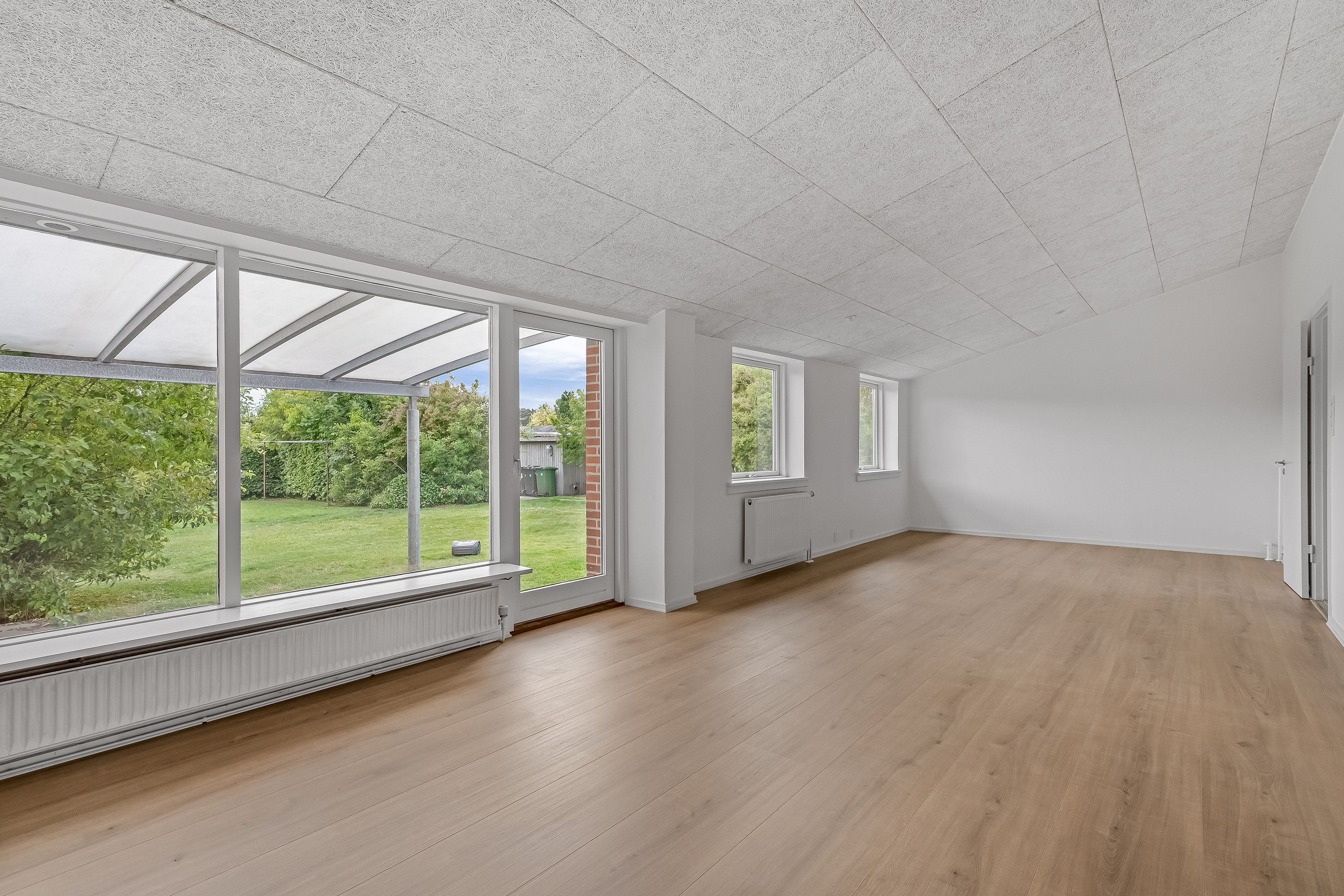 Fremhævet stue billede i fuldskærmstilstand. Billede af Klitrosevej 19, 7500 Holstebro