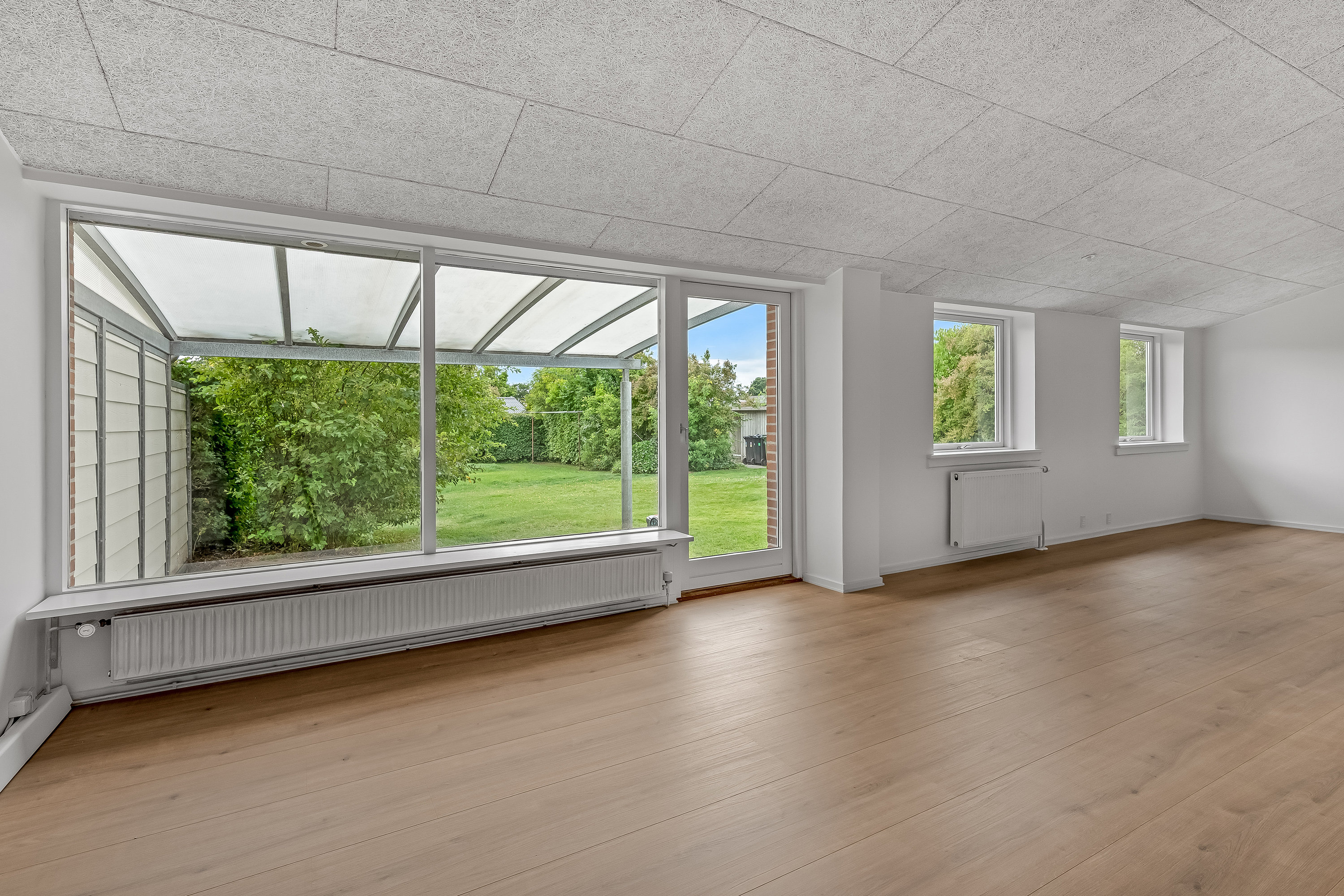 Fremhævet stue billede i fuldskærmstilstand. Billede af Klitrosevej 19, 7500 Holstebro