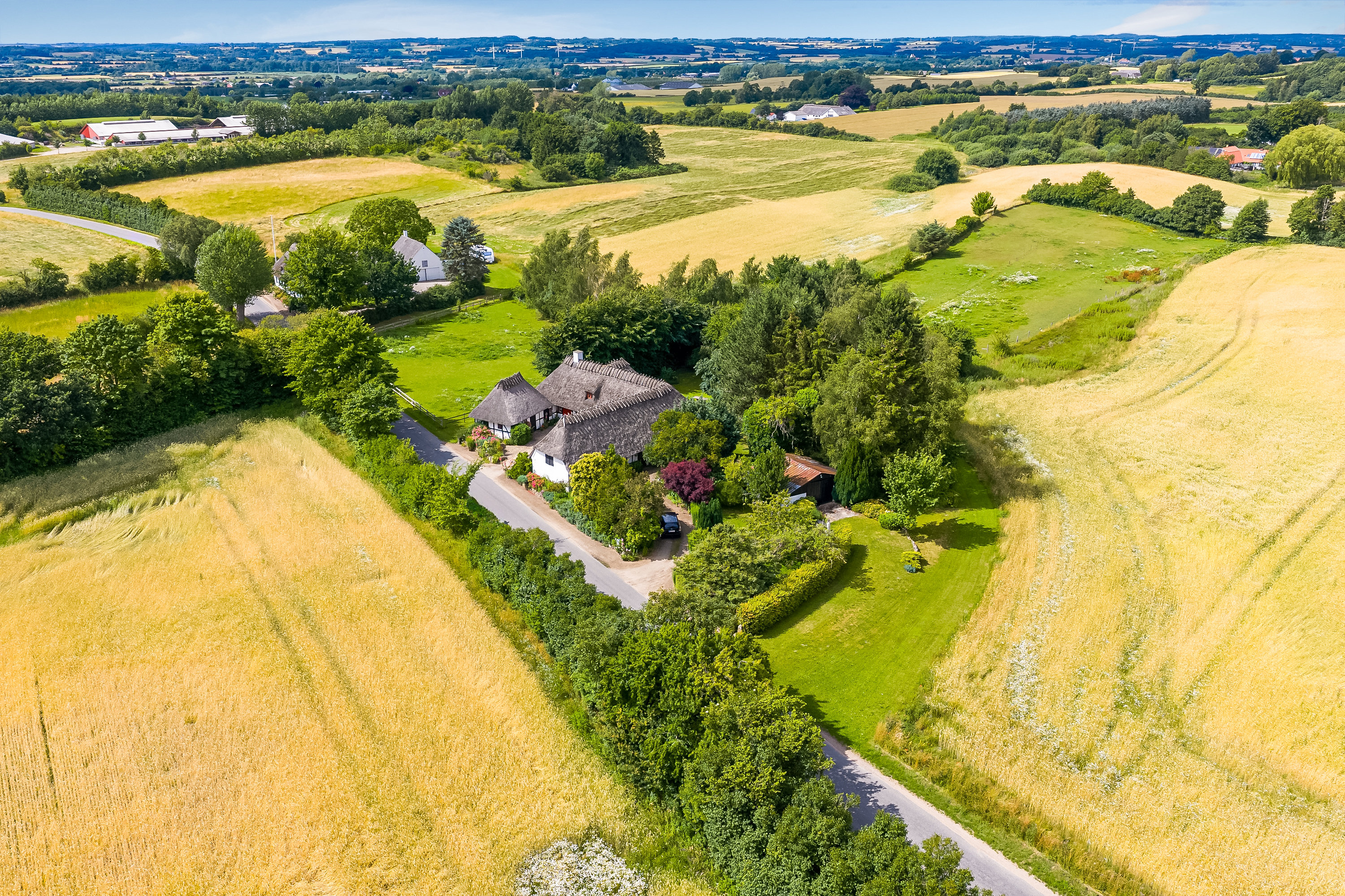 Fremhævet luftfoto billede i fuldskærmstilstand. Billede af Strandbyvej 77, 5683 Haarby