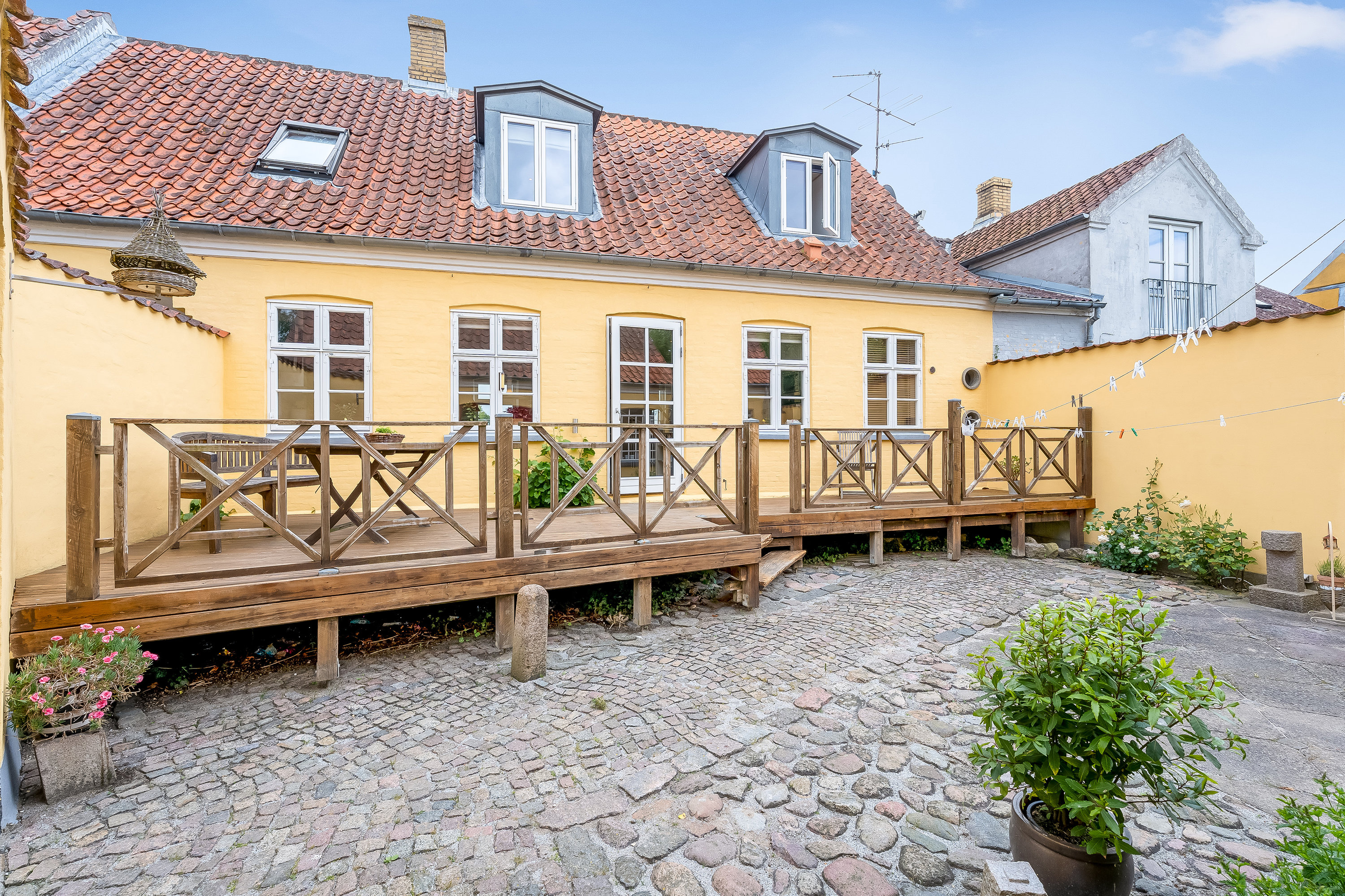 Fremhævet gårdhave billede i fuldskærmstilstand. Billede af Adelgade 4B og 4A, 4880 Nysted