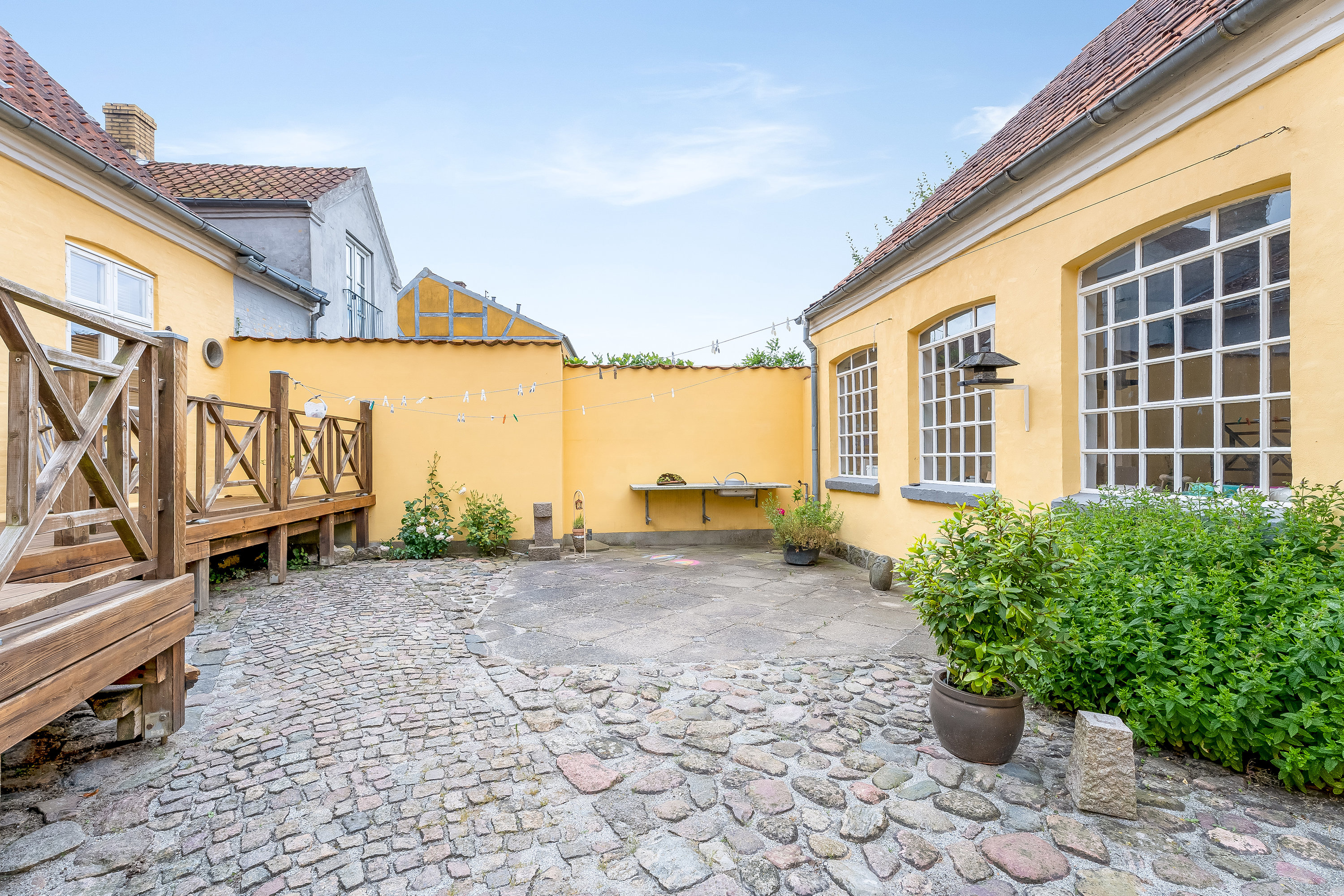 Fremhævet gårdhave billede i fuldskærmstilstand. Billede af Adelgade 4B og 4A, 4880 Nysted