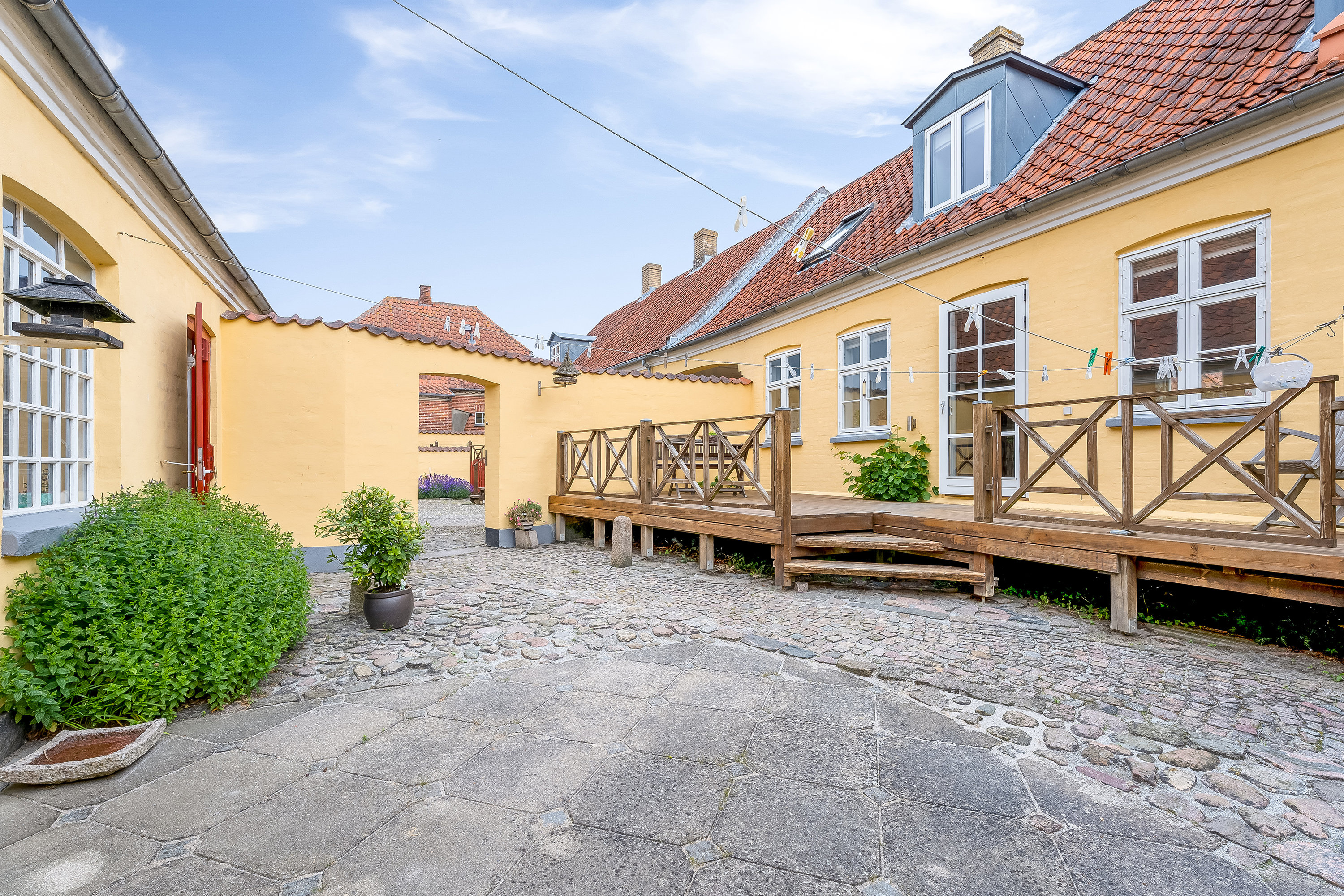 Fremhævet gårdhave billede i fuldskærmstilstand. Billede af Adelgade 4B og 4A, 4880 Nysted