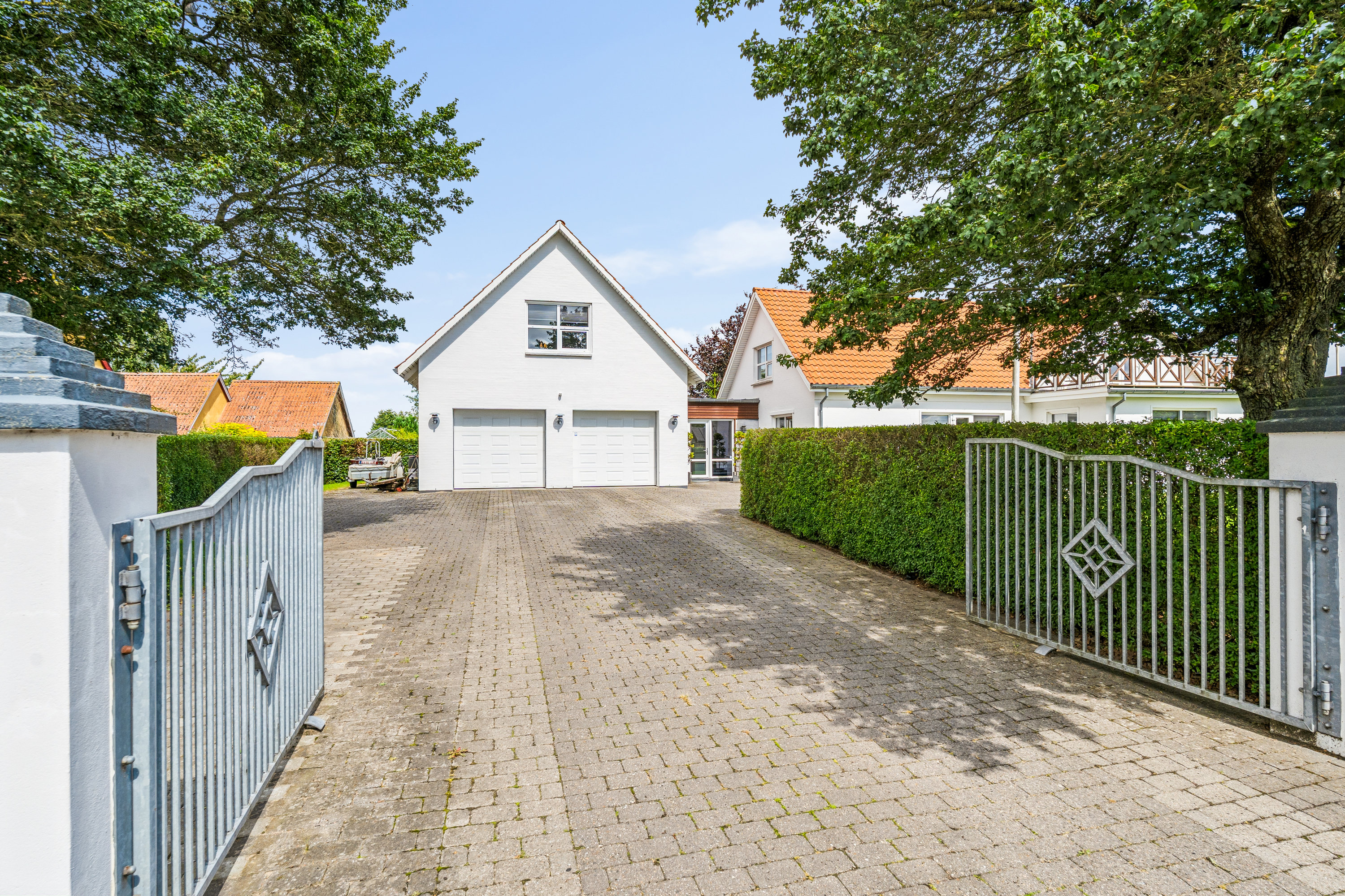 Fremhævet indkørsel billede i fuldskærmstilstand. Billede af Møllevej 21, 8783 Hornsyld