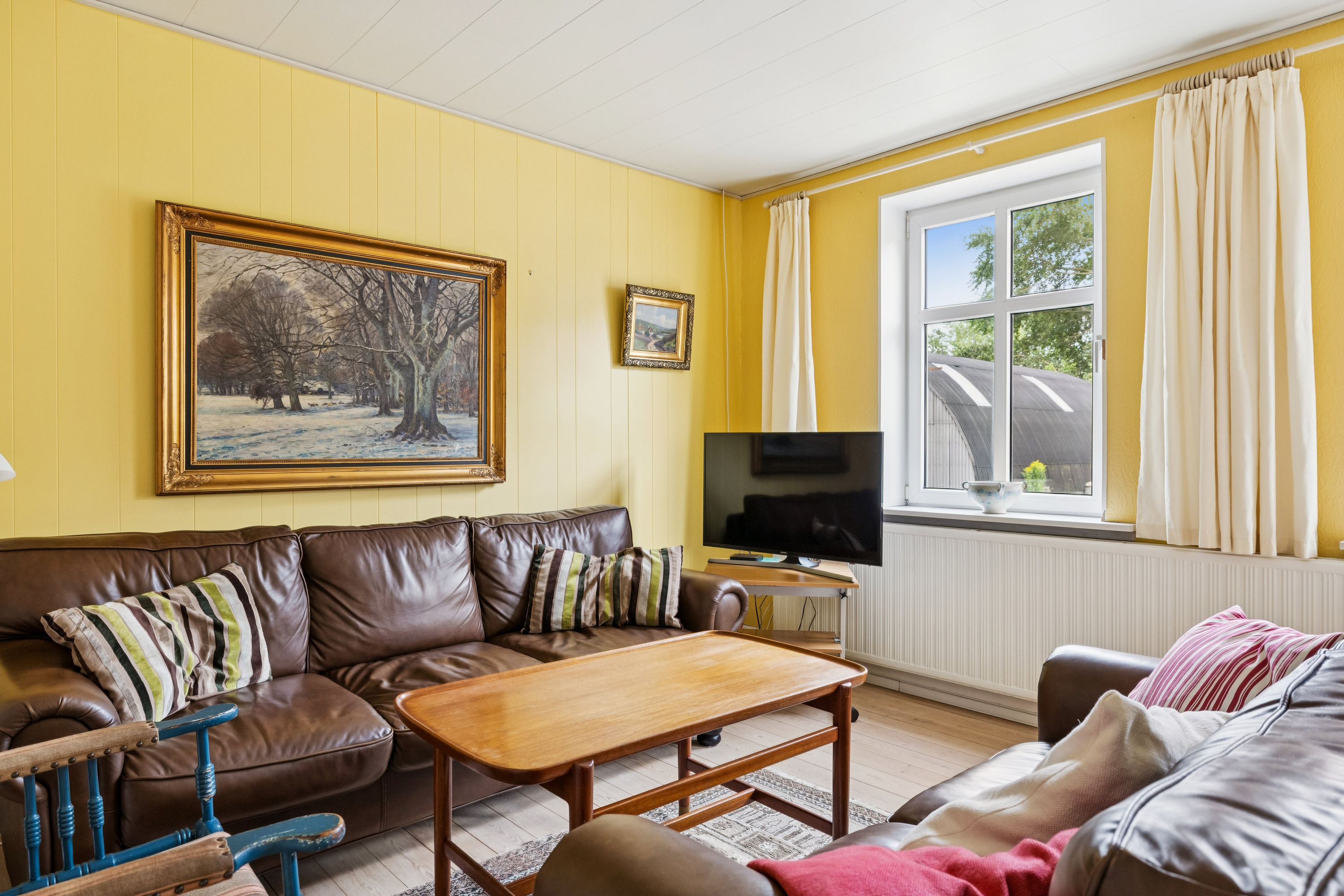 Fremhævet stue billede i fuldskærmstilstand. Billede af Lebymarksvej 12, 5985 Søby Ærø