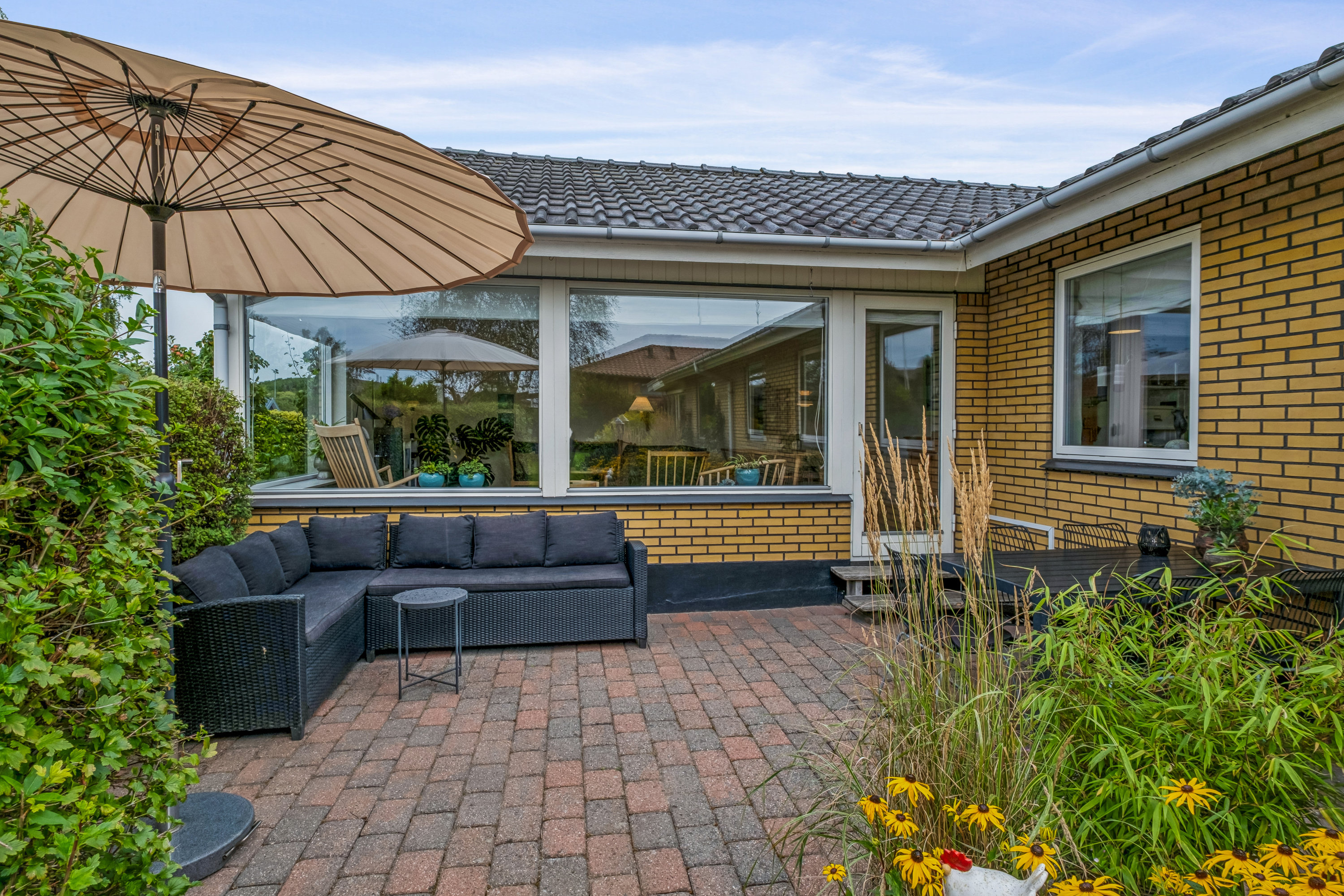 Fremhævet terrasse billede i fuldskærmstilstand. Billede af Præstevænget 10, 8732 Hovedgård