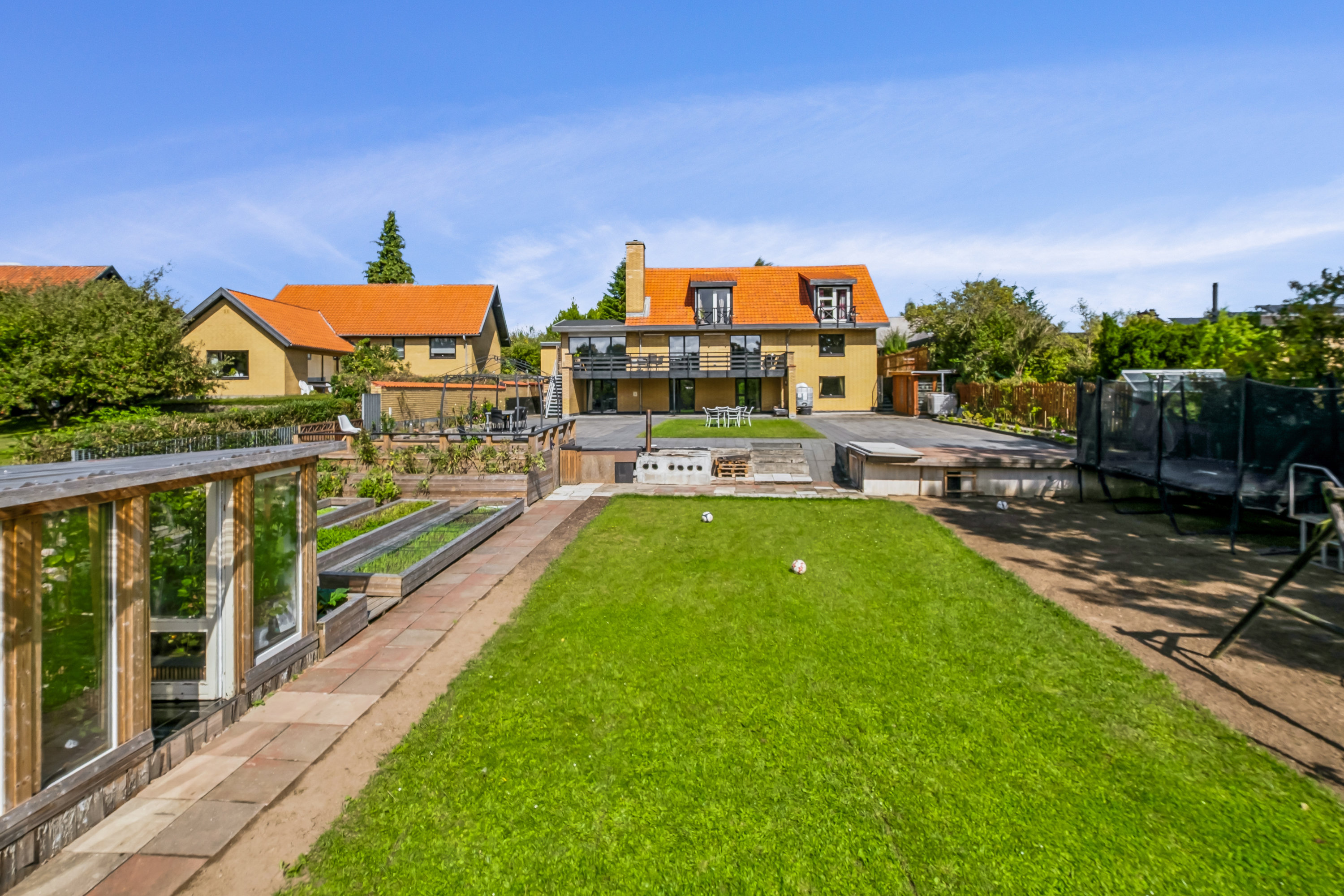 Fremhævet ejendommen set fra haven billede i fuldskærmstilstand. Billede af Rønnevej 19, 8700 Horsens