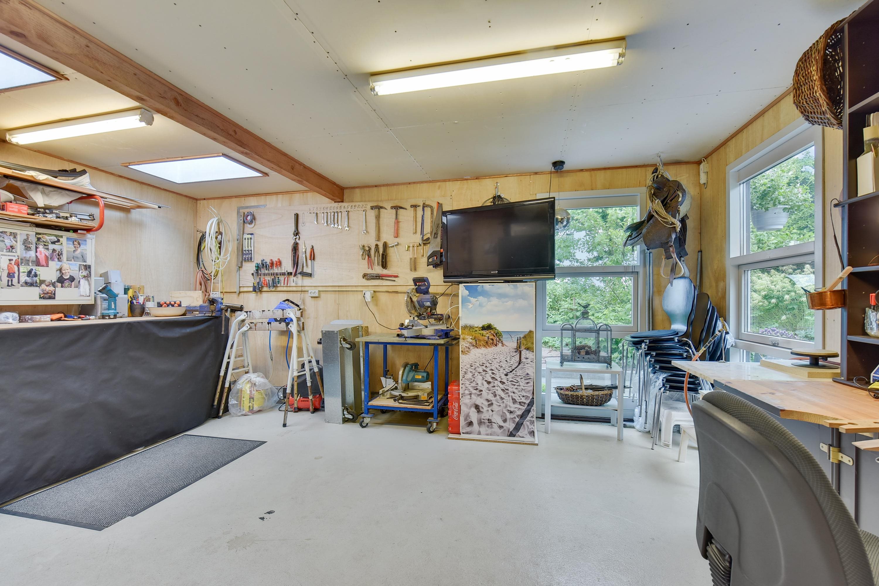 Fremhævet garage billede i fuldskærmstilstand. Billede af Mølleparken 15, 7184 Vandel