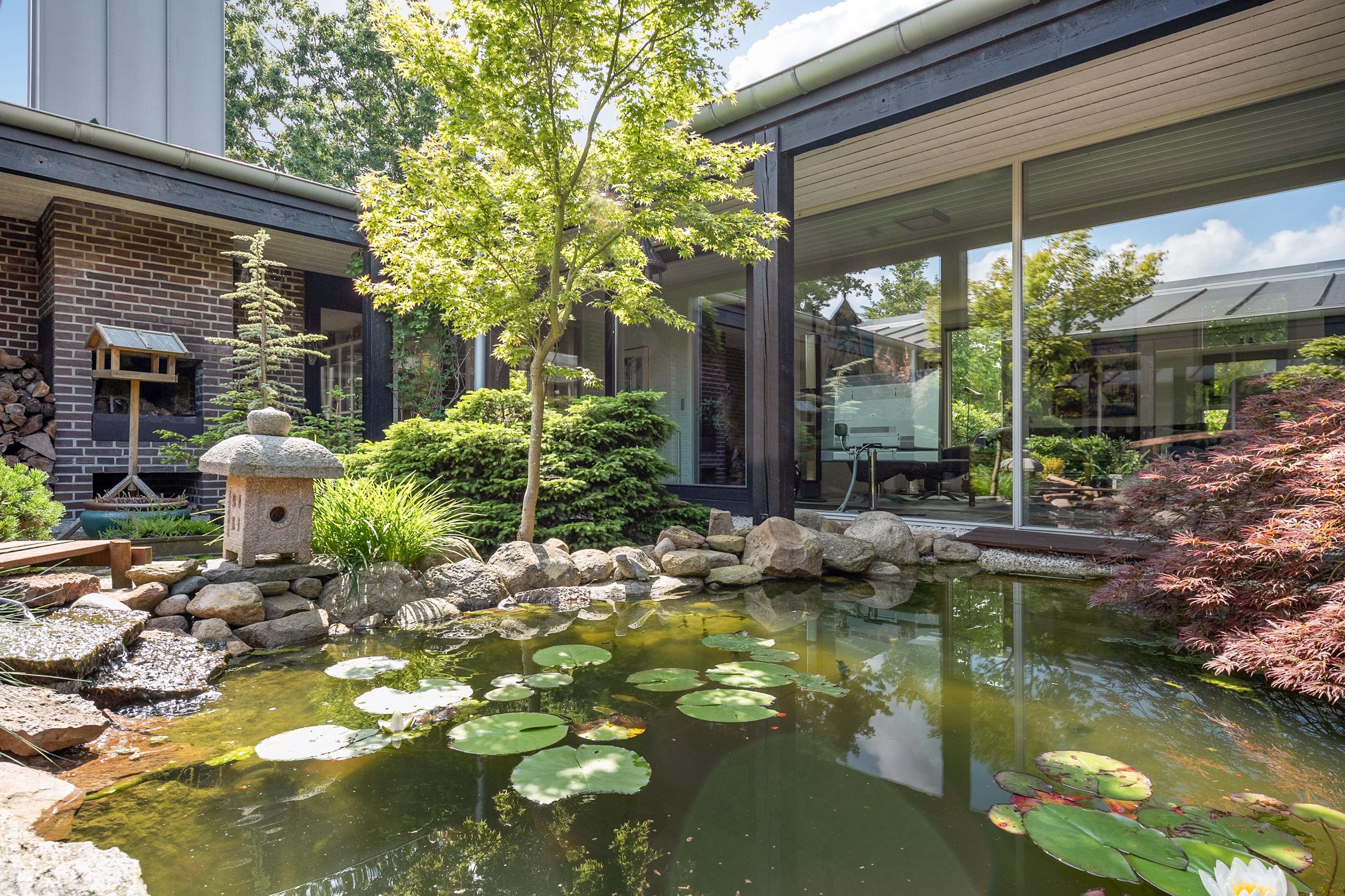 Fremhævet atriumgård billede i fuldskærmstilstand. Billede af Mølleparken 15, 7184 Vandel